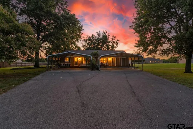 a view of house with outdoor space and street view