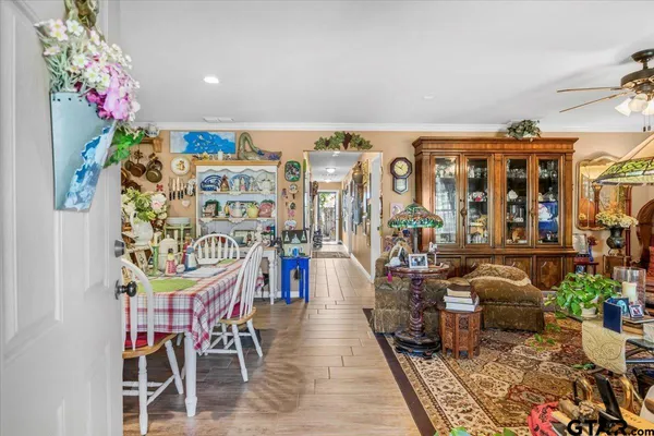 a very nice looking room with furniture and a potted plant