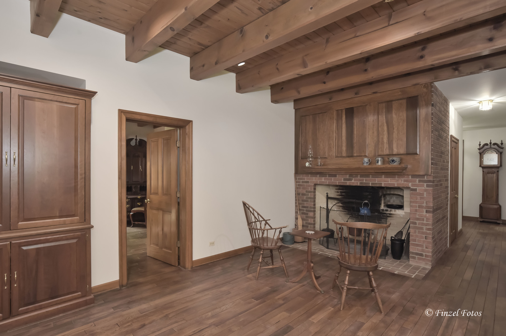 3816 Deep Cut Road Woodstock, IL 60098 - Photo 12 of 32 a view of a livingroom with furniture and a fireplace