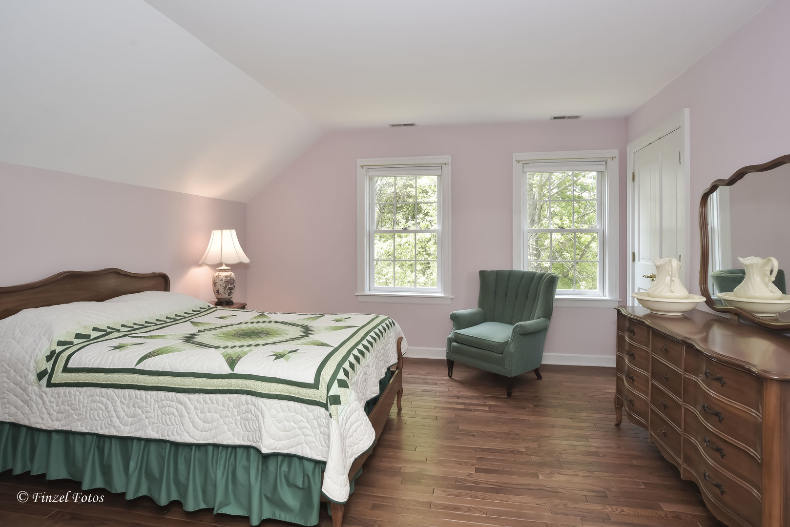 3816 Deep Cut Road Woodstock, IL 60098 - Photo 19 of 32 a bedroom with a bed a table and chair