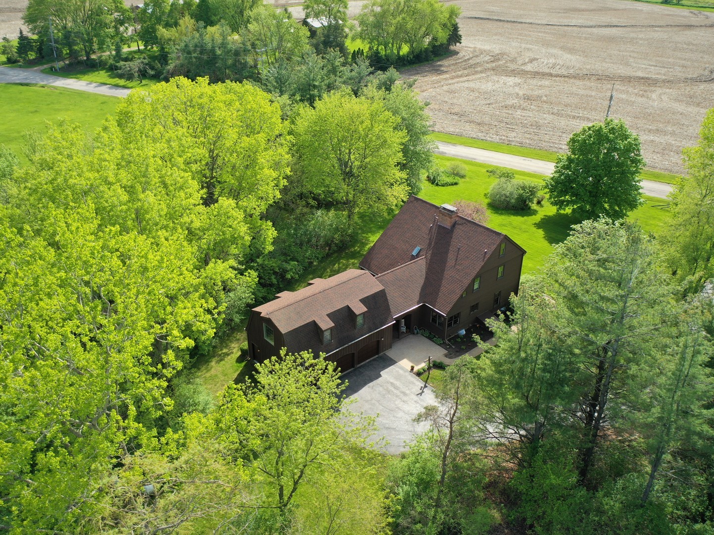 3816 Deep Cut Road Woodstock, IL 60098 - Photo 30 of 32 a view of a chairs in backyard of the house