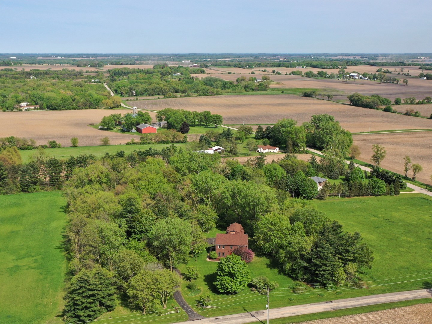 3816 Deep Cut Road Woodstock, IL 60098 - Photo 32 of 32 a view of a lake with a city