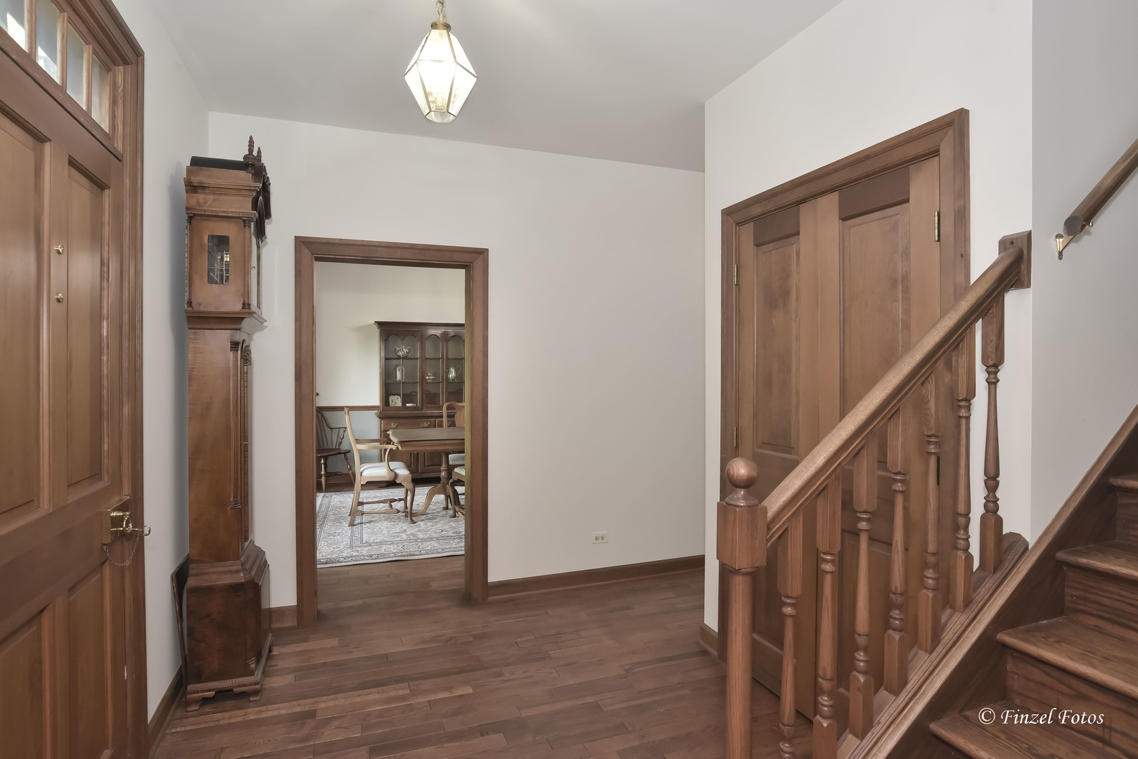3816 Deep Cut Road Woodstock, IL 60098 - Photo 5 of 32 a view of an entryway with wooden floor and a livingroom