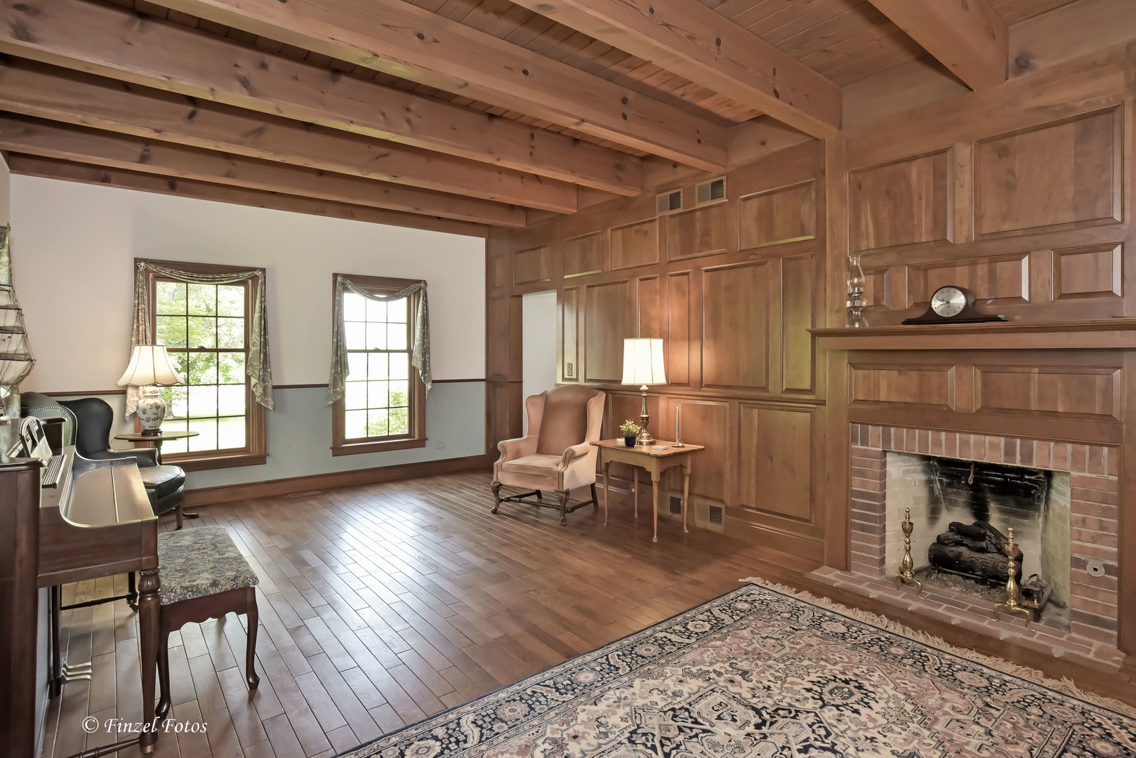 3816 Deep Cut Road Woodstock, IL 60098 - Photo 6 of 32 a living room with furniture and a fireplace