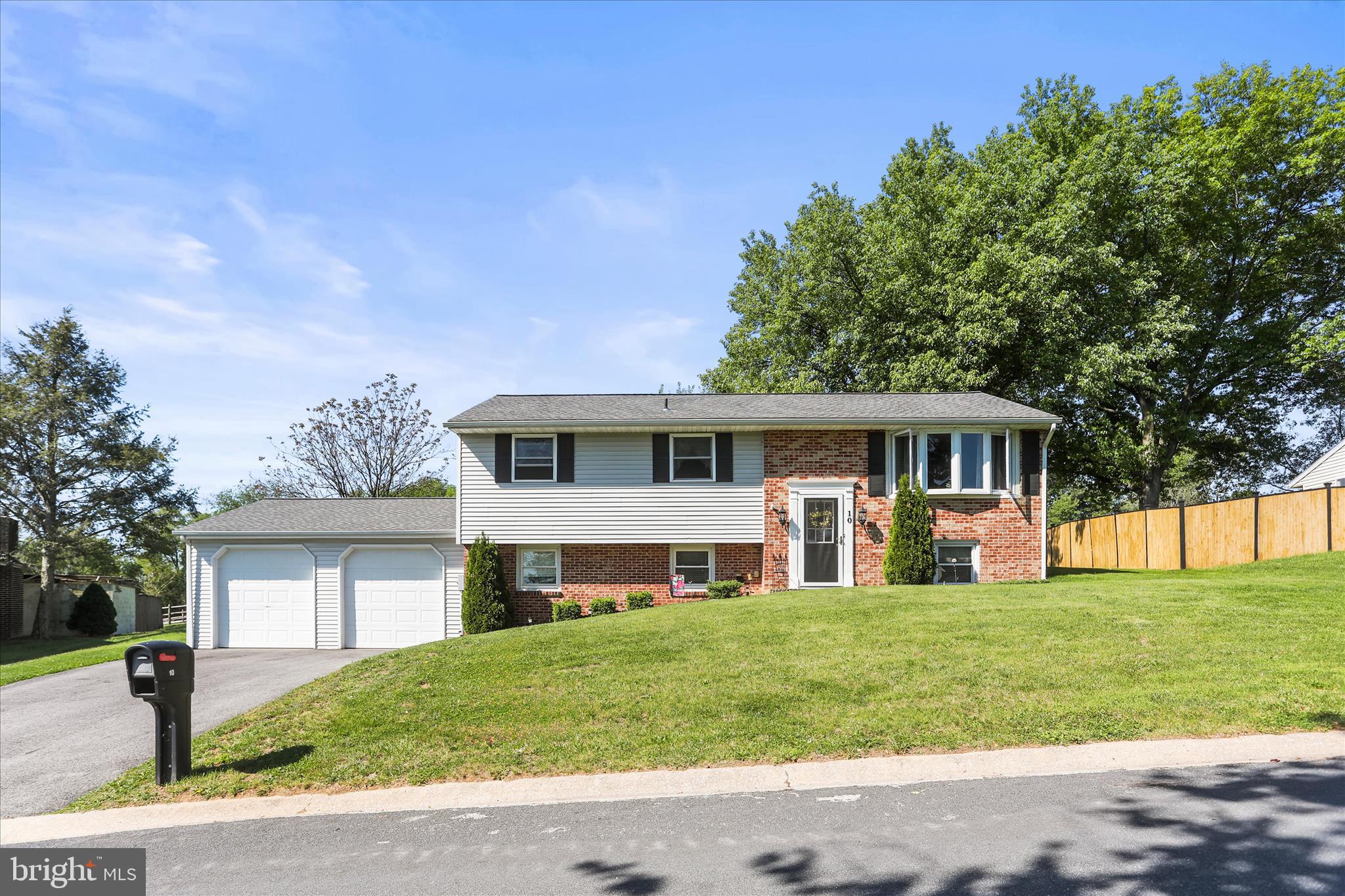 10 Logan Heights Road York, PA 17403 - Photo 1 of 1 a front view of a house with a yard