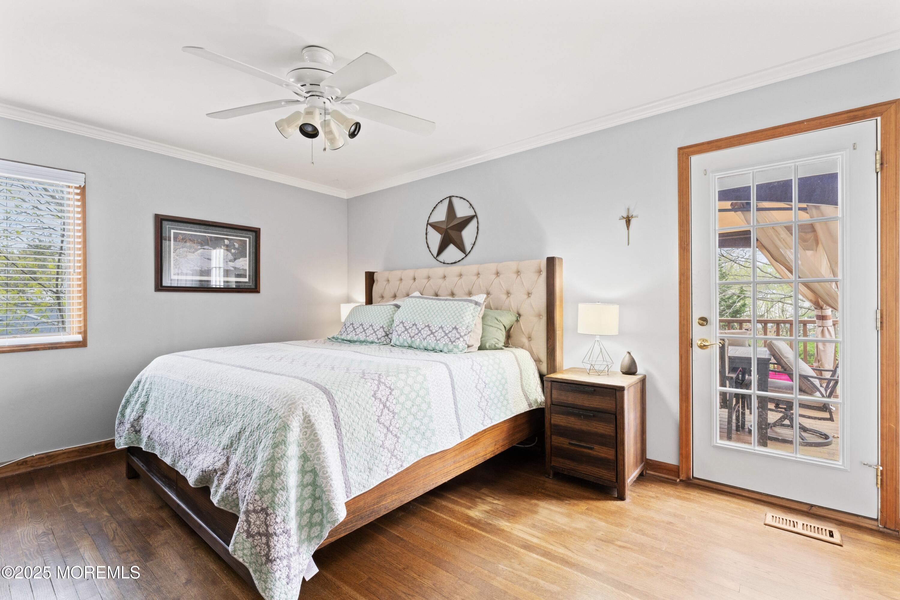 35 Chestnut Hill Road Howell, NJ 07731 - Photo 11 of 30 a bedroom with a bed a dresser and a window