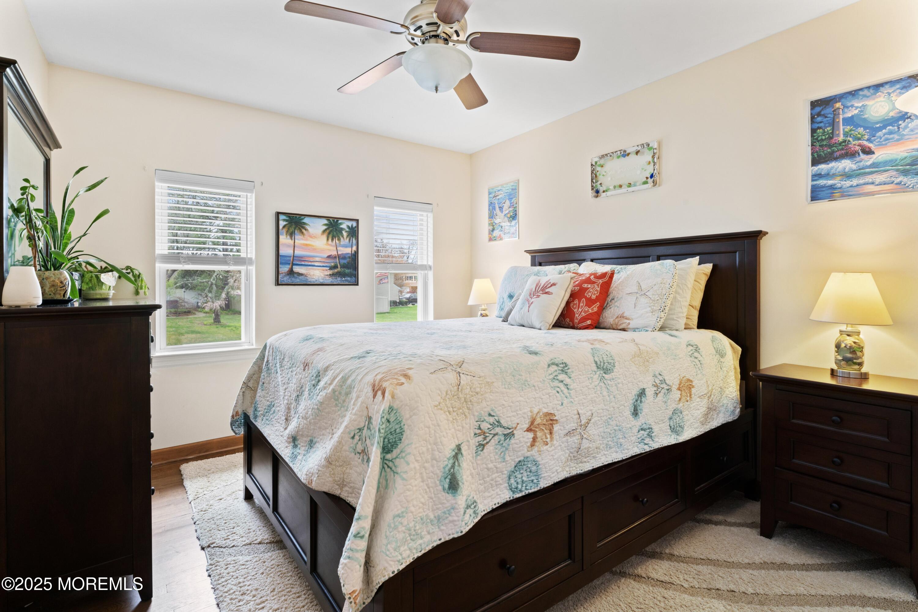 35 Chestnut Hill Road Howell, NJ 07731 - Photo 13 of 30 a bed sitting in a bedroom next to a lamp