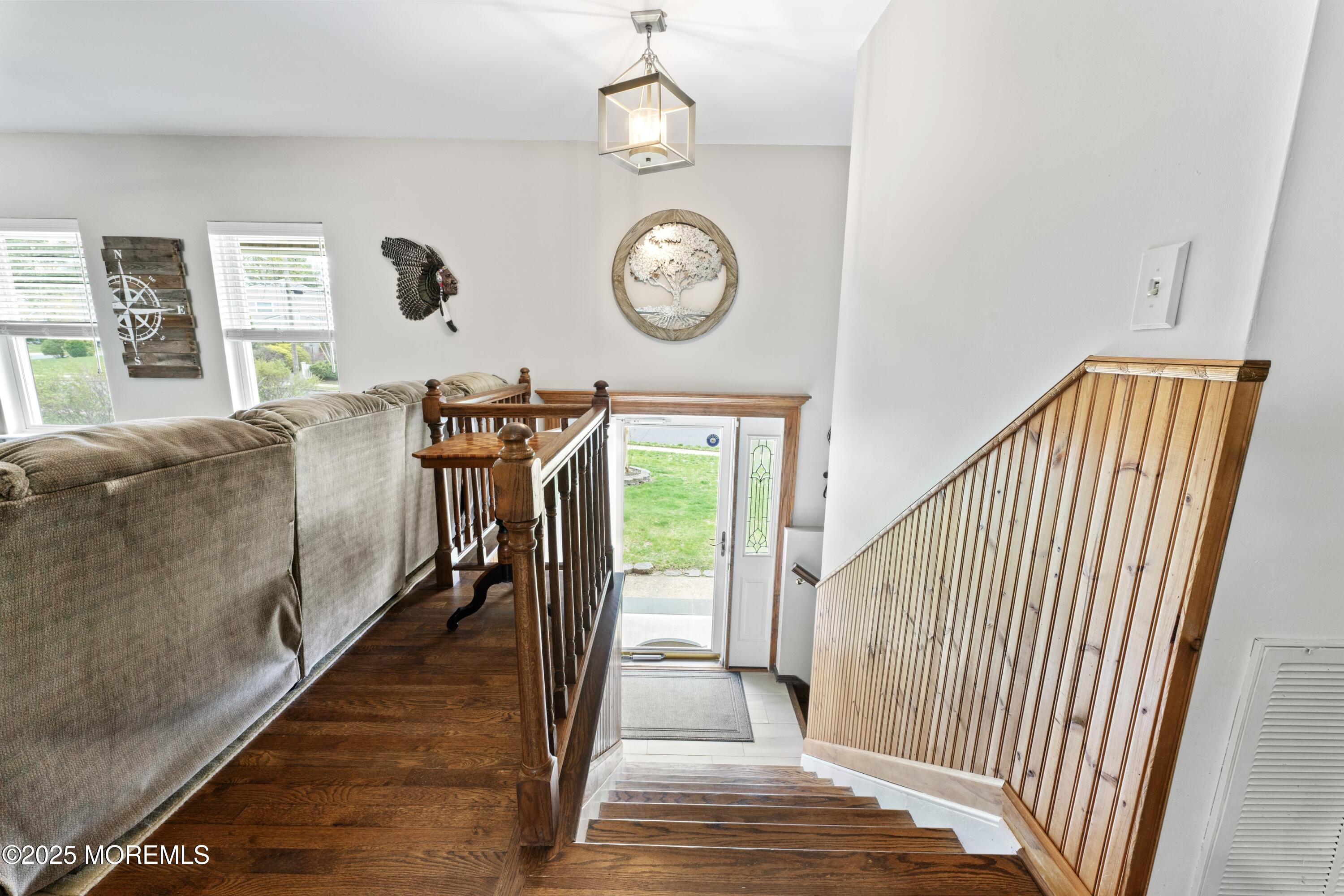 35 Chestnut Hill Road Howell, NJ 07731 - Photo 16 of 30 a view of a hallway with wooden floor and a hallway