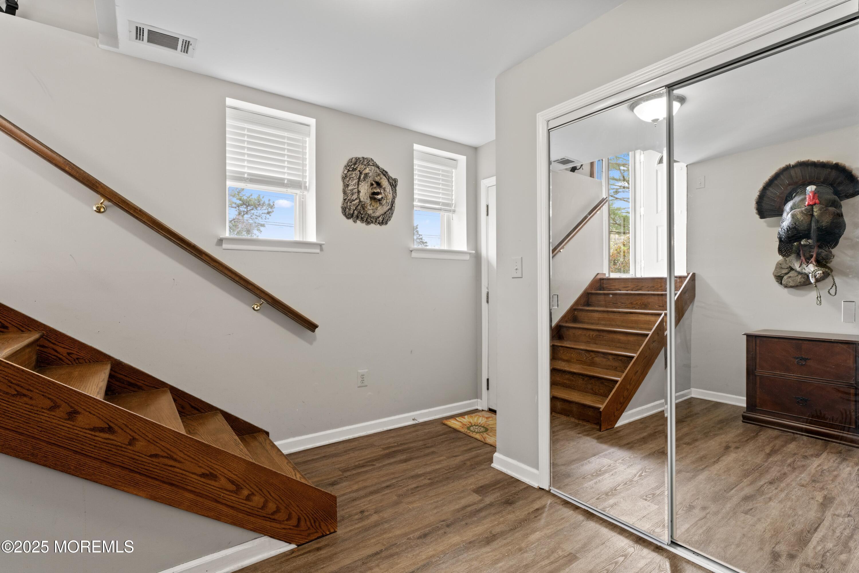 35 Chestnut Hill Road Howell, NJ 07731 - Photo 21 of 30 a view of entryway and hall with wooden floor