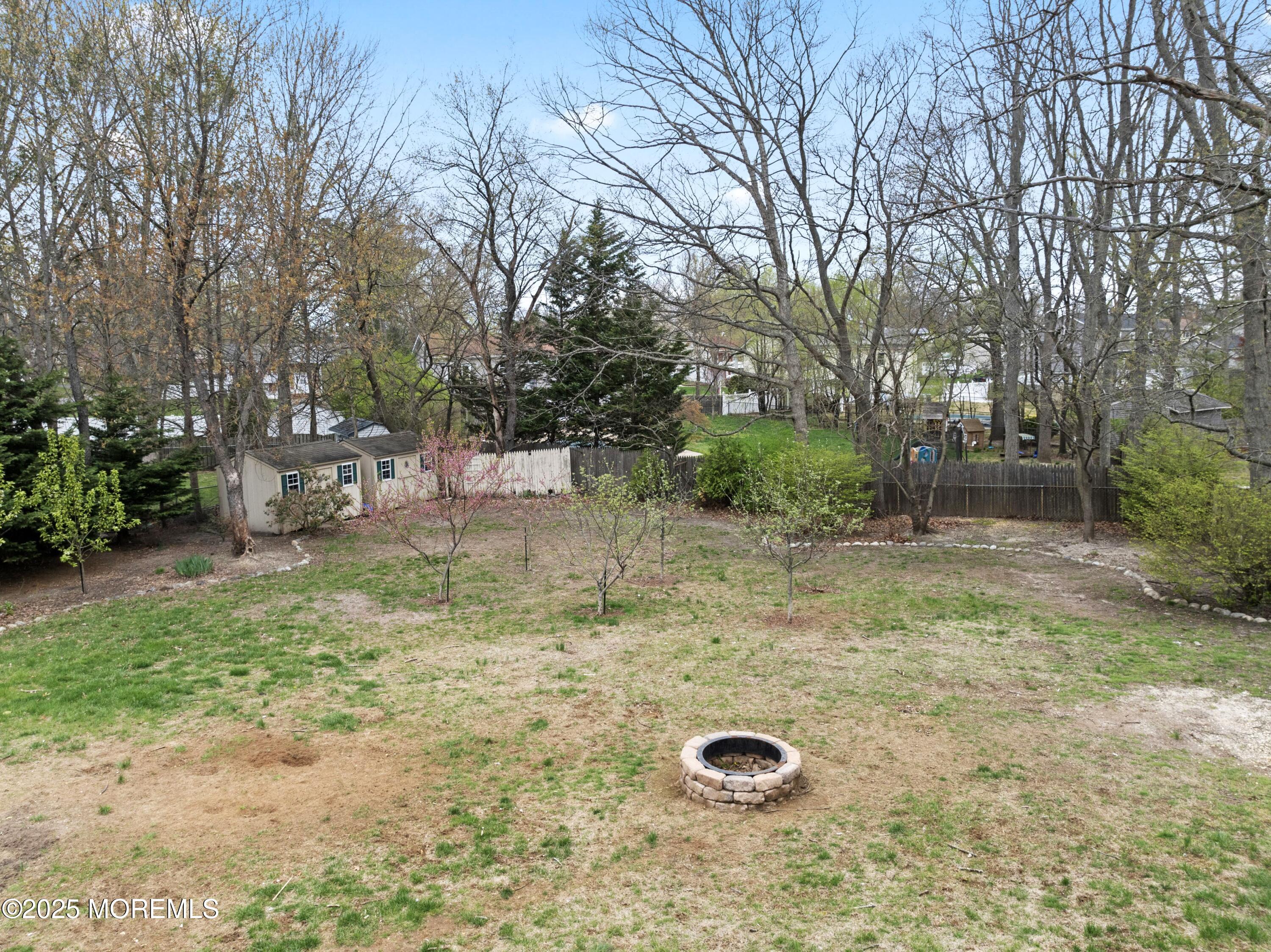 35 Chestnut Hill Road Howell, NJ 07731 - Photo 24 of 30 a view of a backyard with basketball court