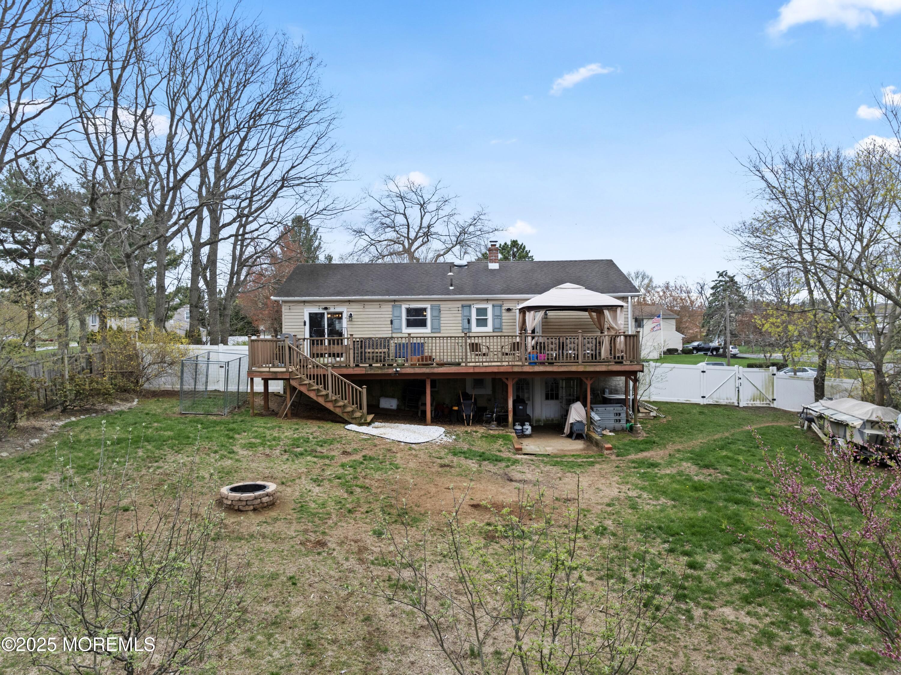 35 Chestnut Hill Road Howell, NJ 07731 - Photo 25 of 30 a view of a house with a yard and sitting area