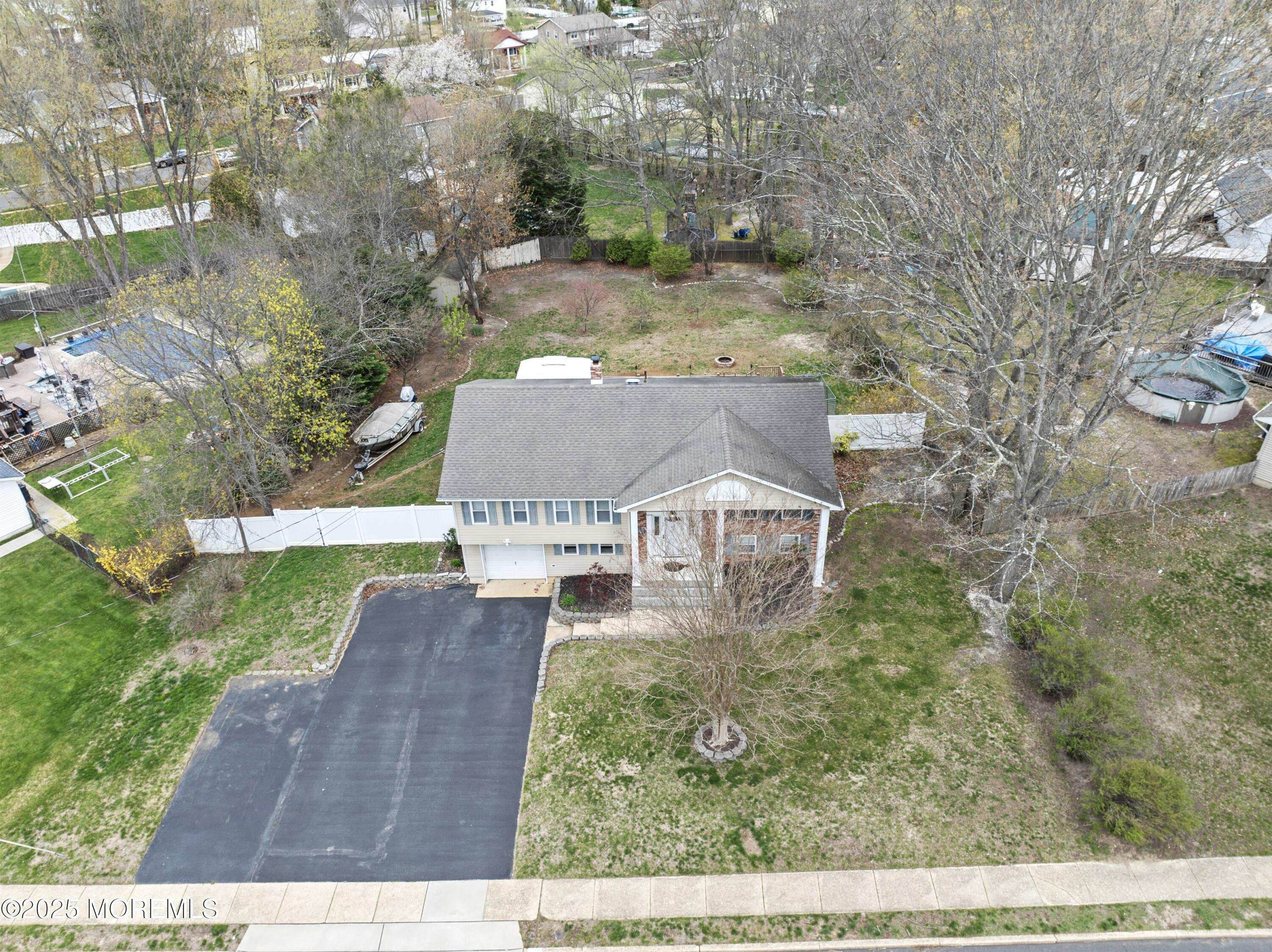 35 Chestnut Hill Road Howell, NJ 07731 - Photo 26 of 30 an aerial view of a house with a yard