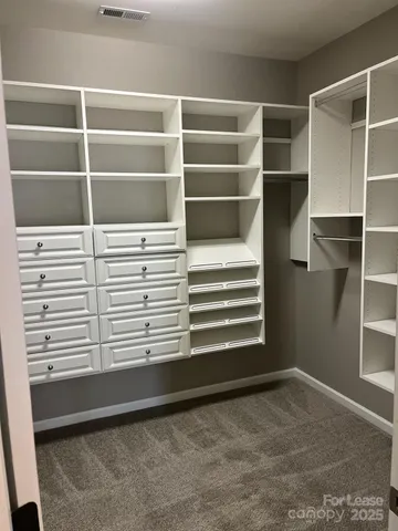 a view of a room with rack on the wall