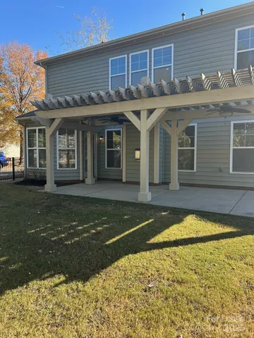 a view of a house with a swimming pool