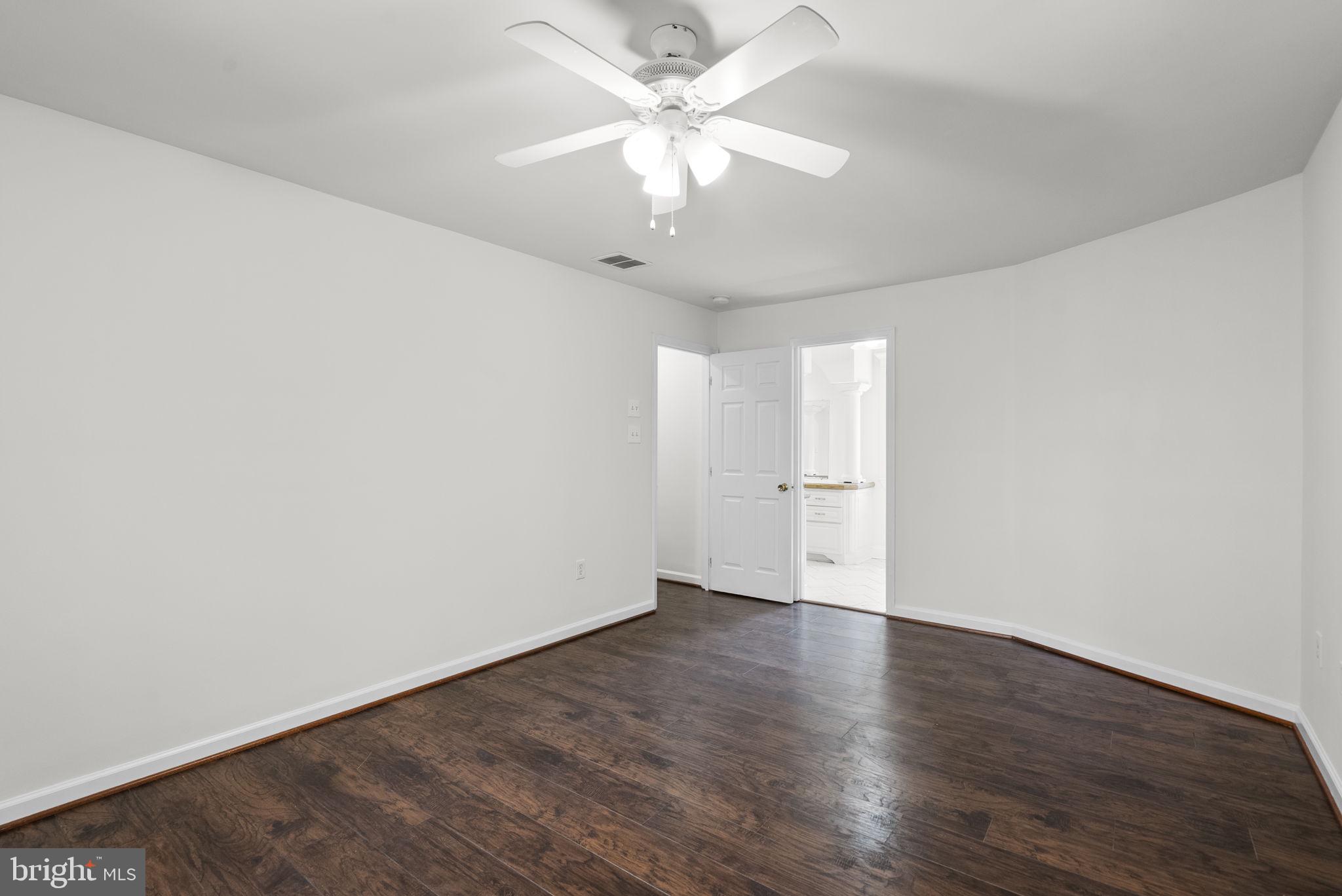 24000 Clarksburg Road Clarksburg, MD 20871 - Photo 22 of 60 wooden floor in an empty room