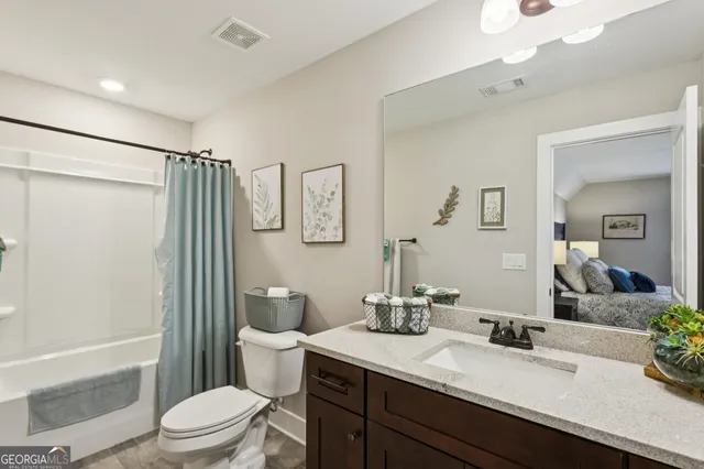 a bedroom with a bed and a table