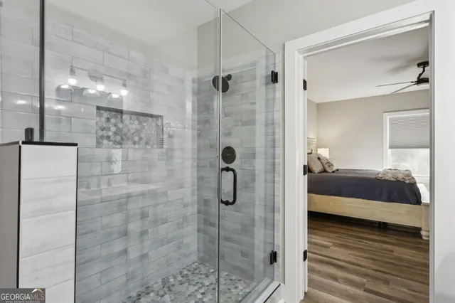 a view of a room with gym equipment and windows