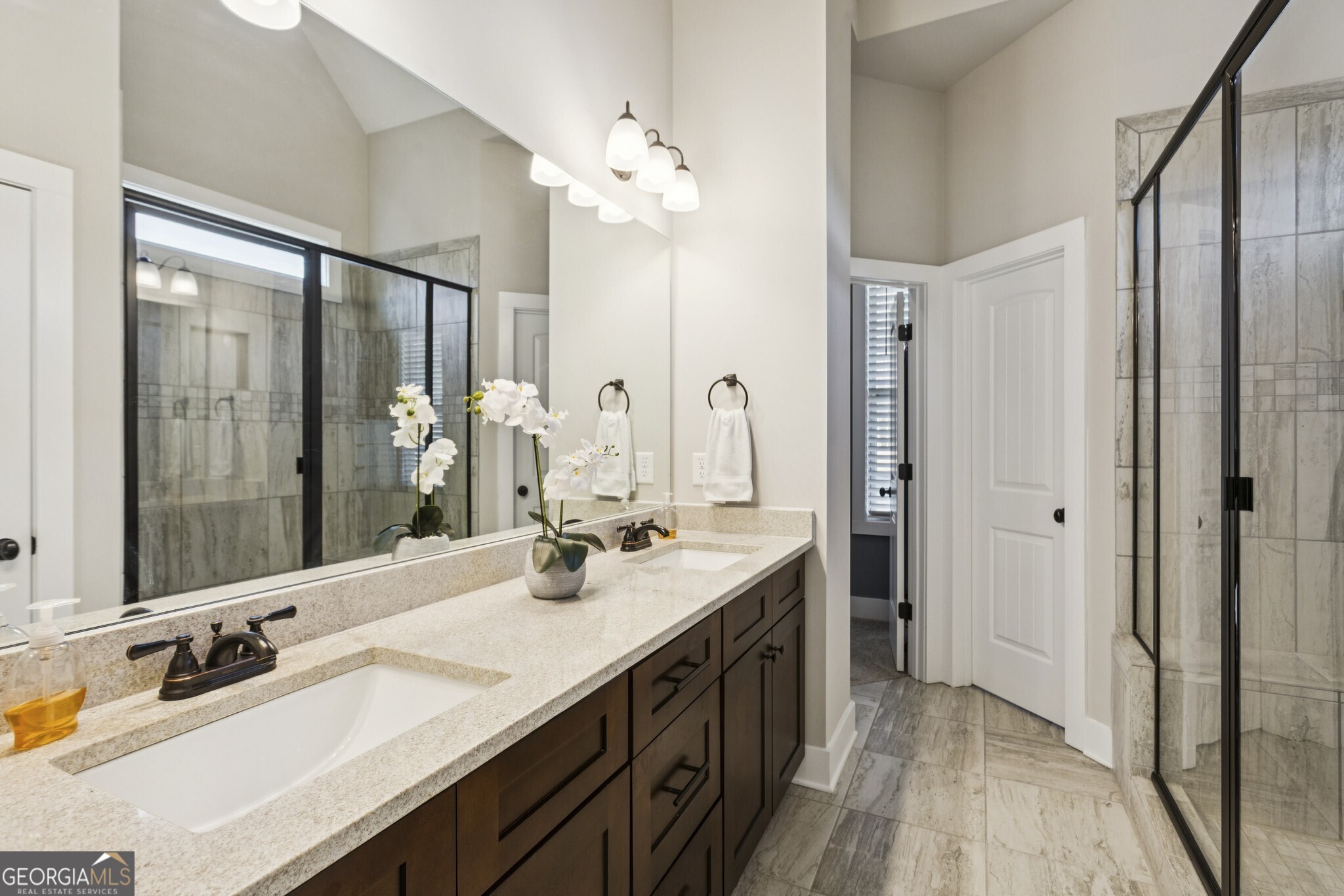 20 Bluestone Way Northeast Cartersville, GA 30121 - Photo 5 of 55 Primary Spa-Like Ensuite Bathroom with a Glass Shower, Dual Stone Vanity, and a Large Walk-In Closet