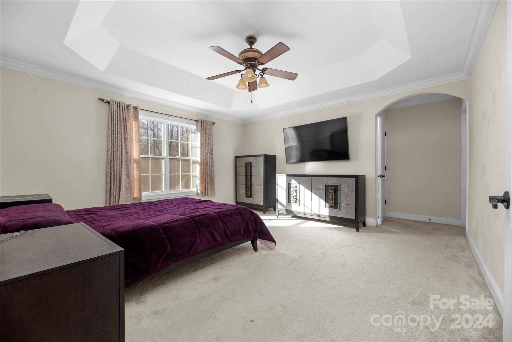 1350 Kensington Circle Newton, NC 28658 - Photo 13 of 45 a bedroom with a bed and a flat screen tv