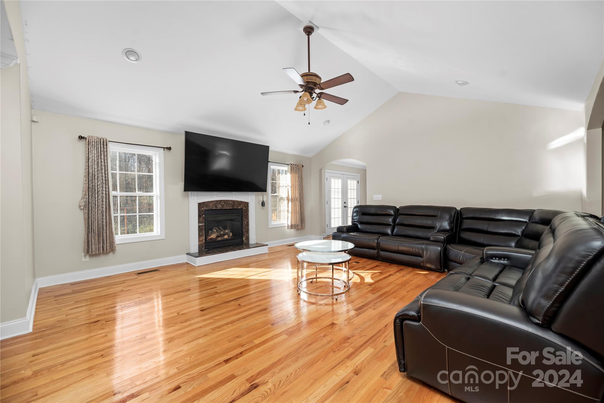 1350 Kensington Circle Newton, NC 28658 - Photo 23 of 45 a living room with furniture fireplace and flat screen tv