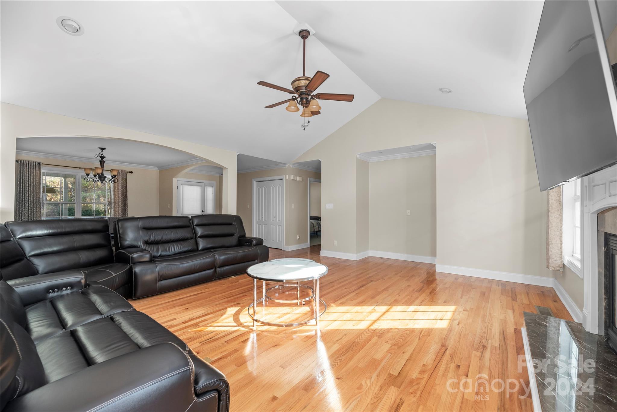 1350 Kensington Circle Newton, NC 28658 - Photo 24 of 45 a living room with furniture and wooden floor