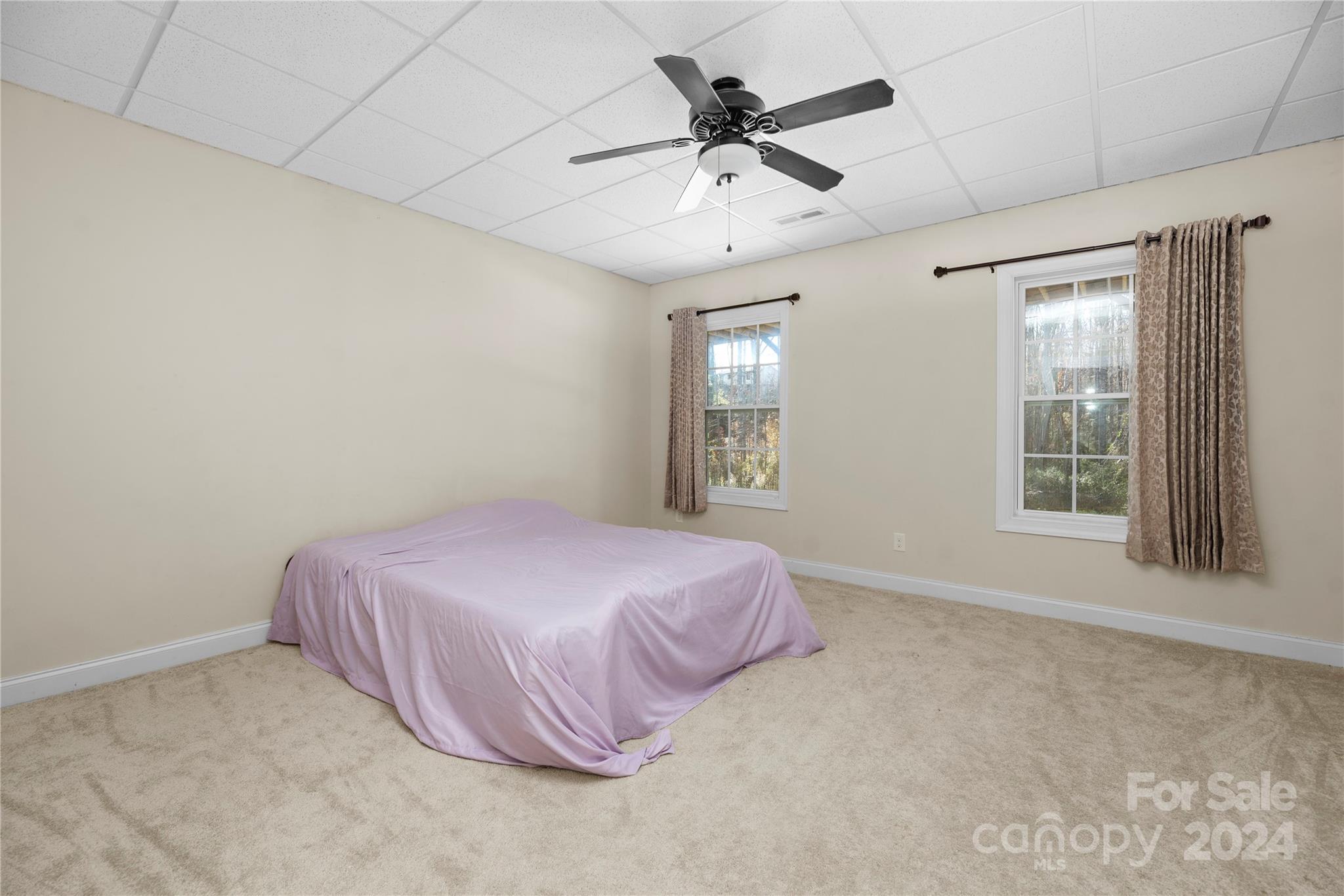 1350 Kensington Circle Newton, NC 28658 - Photo 28 of 45 a spacious bedroom with a bed and a window
