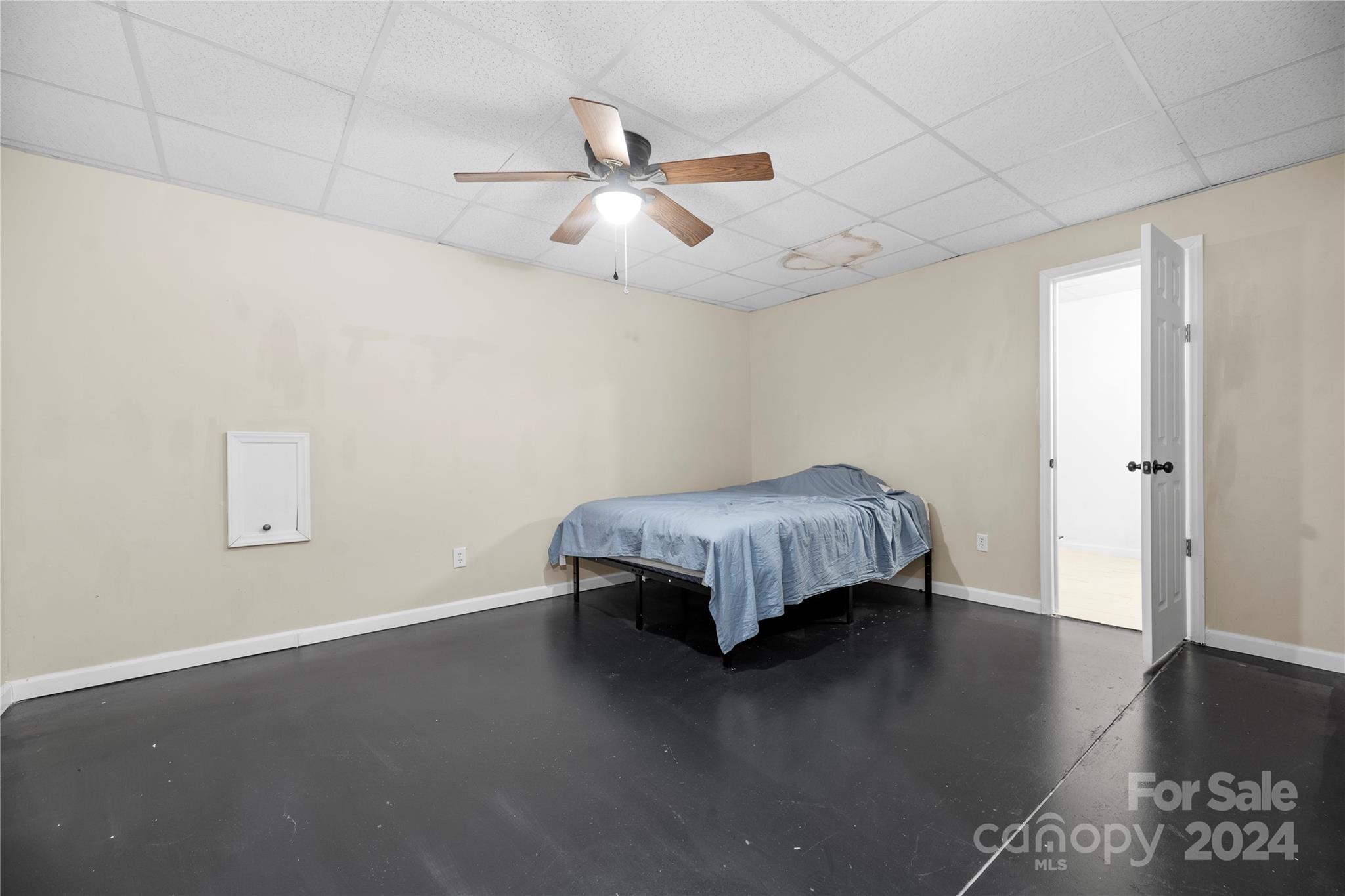 1350 Kensington Circle Newton, NC 28658 - Photo 33 of 45 a bedroom with a bed and wooden floor