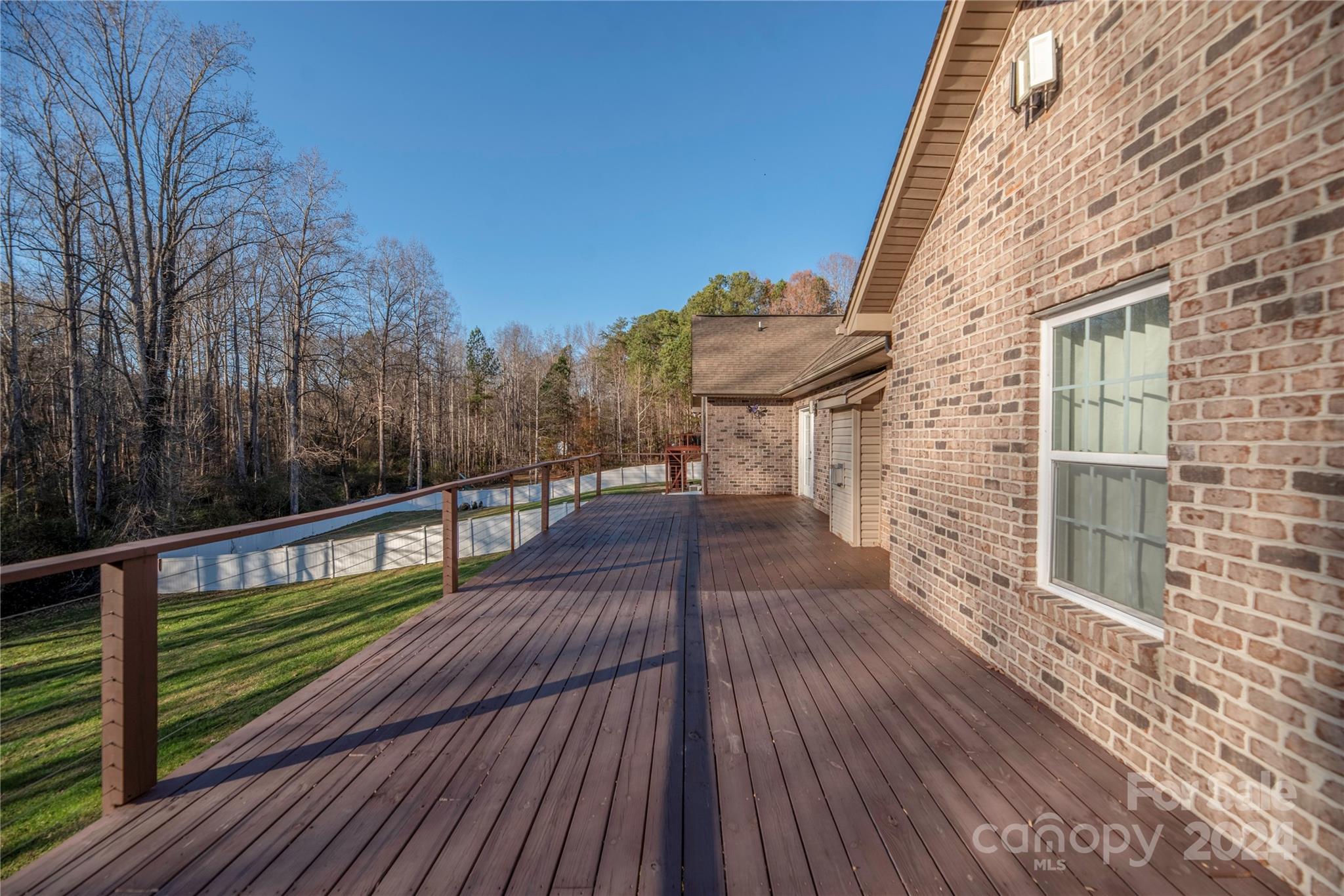 1350 Kensington Circle Newton, NC 28658 - Photo 37 of 45 a view of a balcony with wooden floor and fence