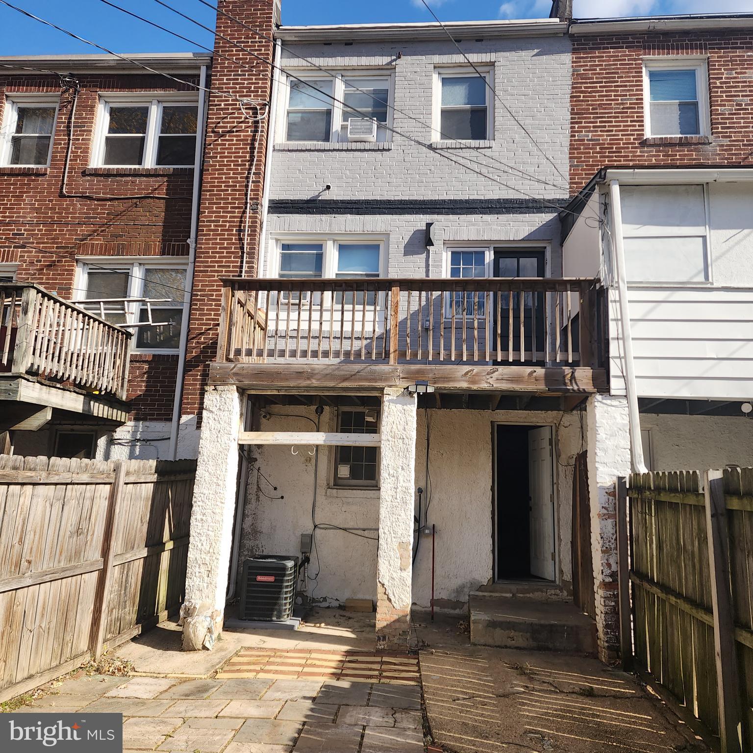 327 Grove Park Road Brooklyn, MD 21225 - Photo 8 of 20 a front view of a house with a door