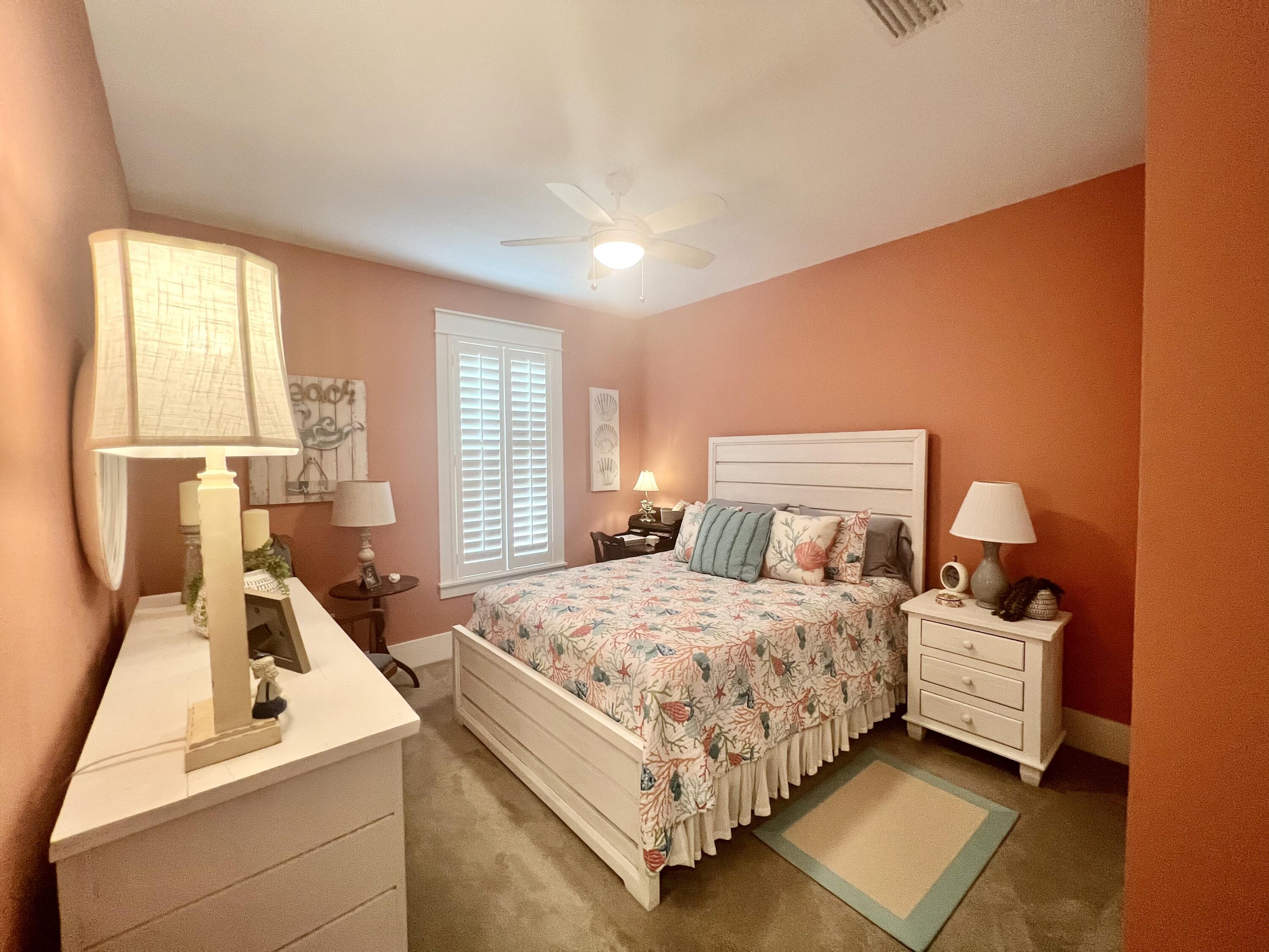 244 Perimeter Place Freeport, FL 32439 - Photo 16 of 72 a bedroom with a bed and a large window