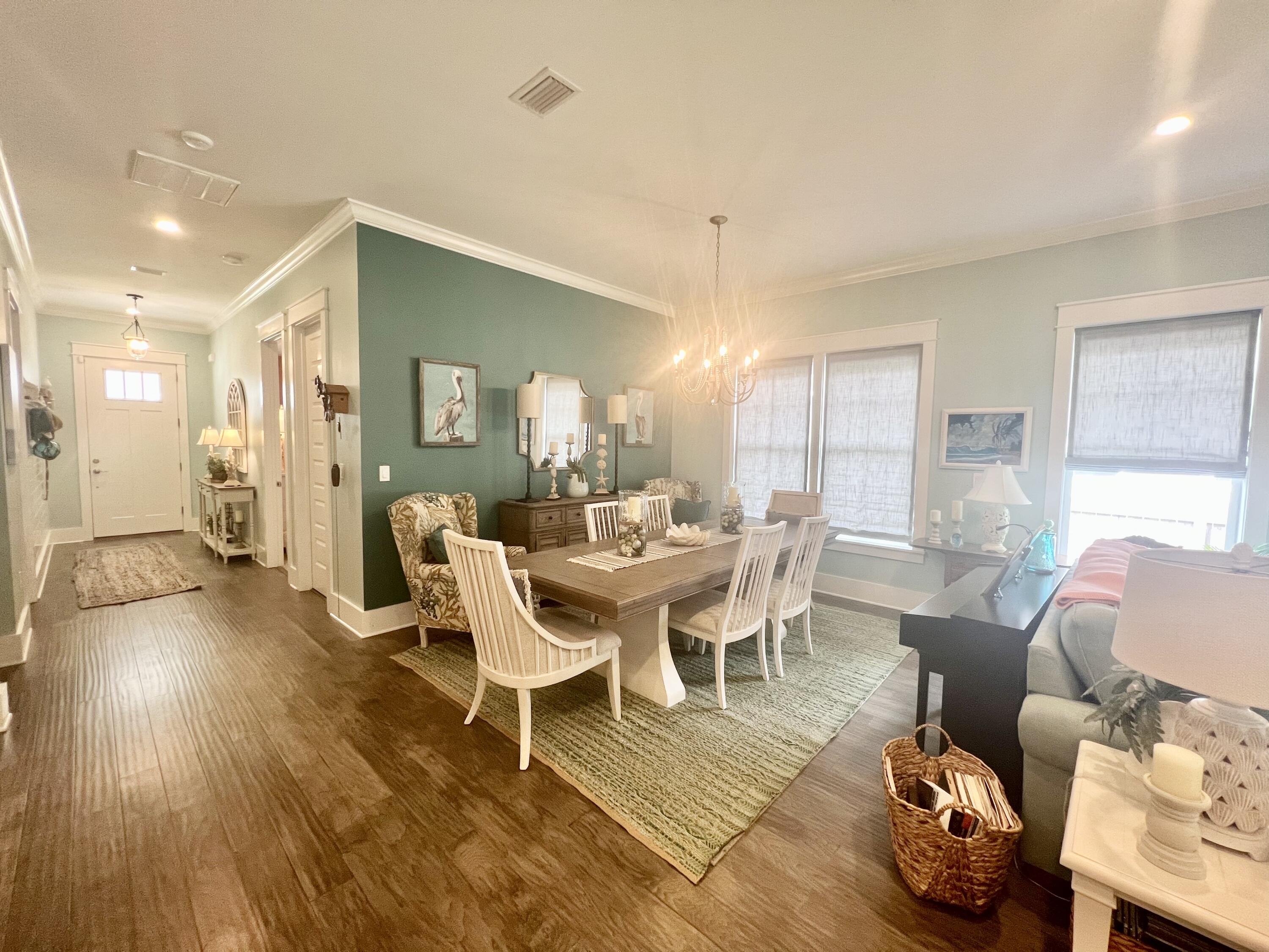 244 Perimeter Place Freeport, FL 32439 - Photo 22 of 72 a living room with furniture and a wooden floor