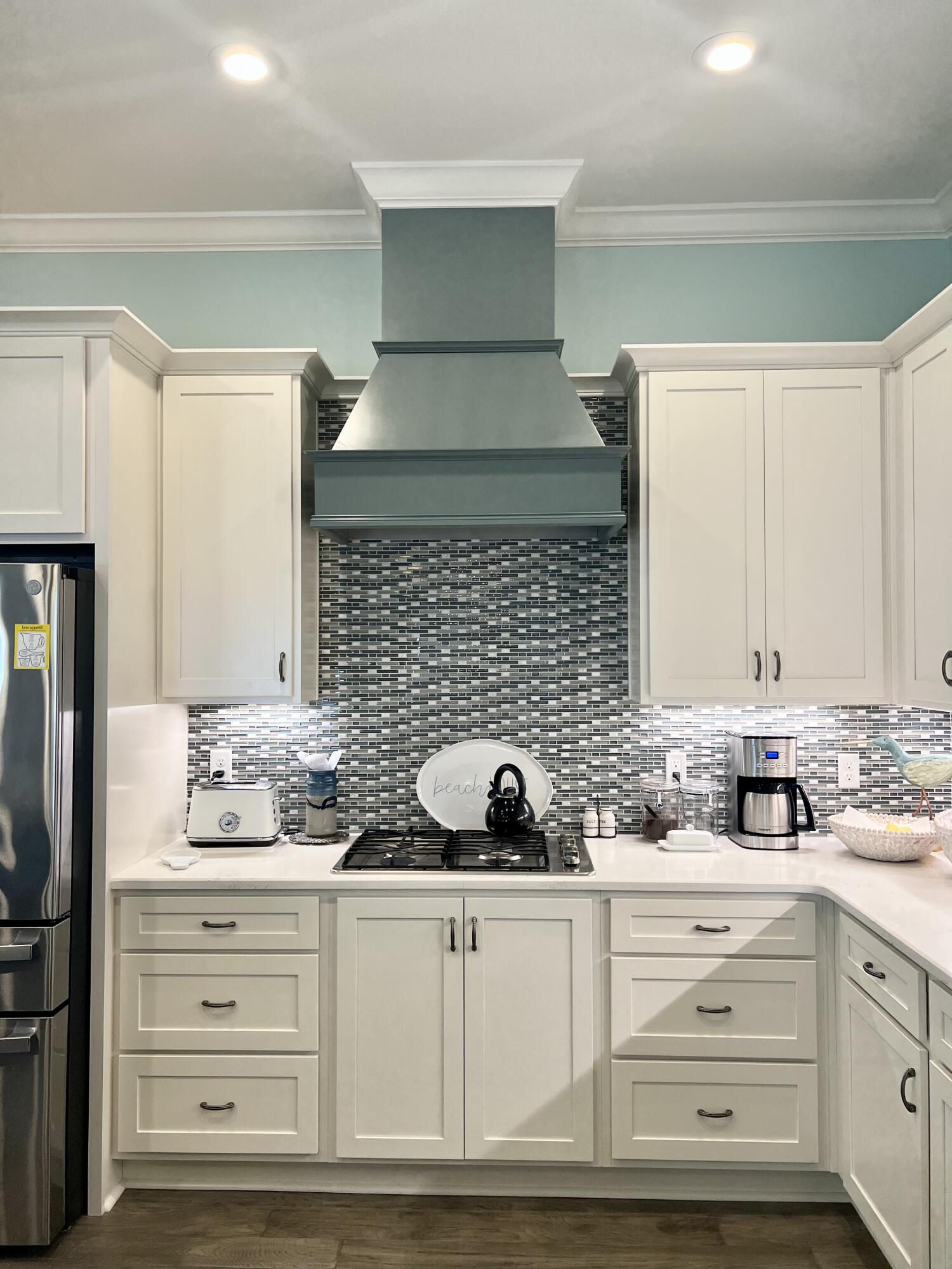 244 Perimeter Place Freeport, FL 32439 - Photo 37 of 72 a bathroom with a sink and a mirror