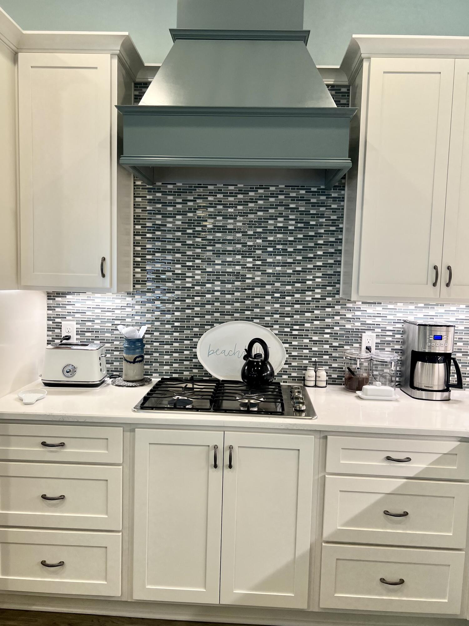 244 Perimeter Place Freeport, FL 32439 - Photo 38 of 72 a kitchen with a sink and cabinets