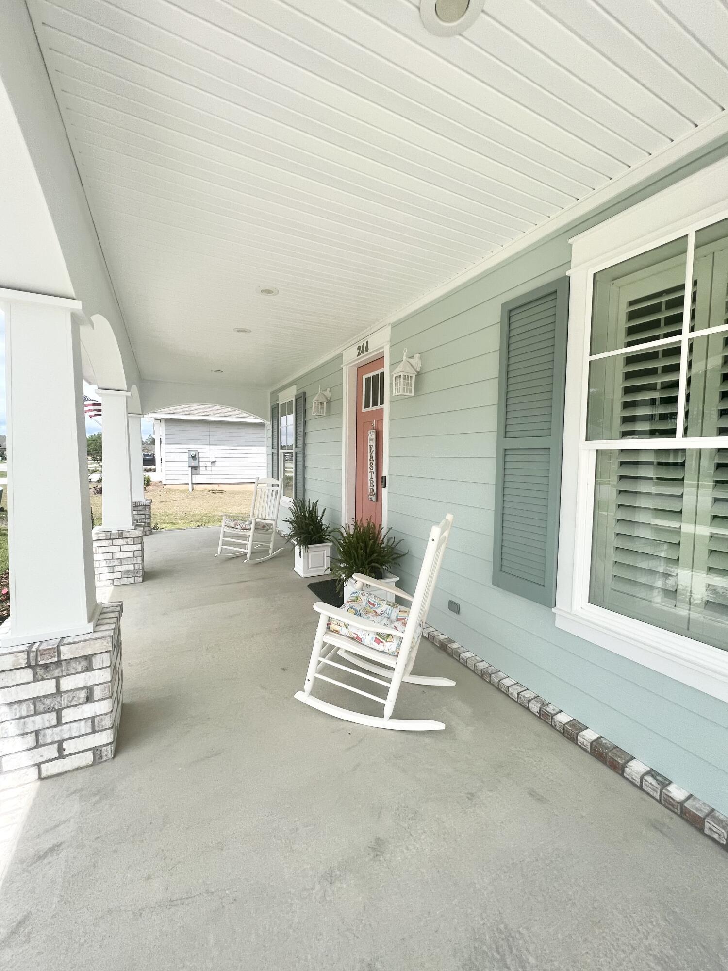 244 Perimeter Place Freeport, FL 32439 - Photo 5 of 72 a living room with furniture and a window