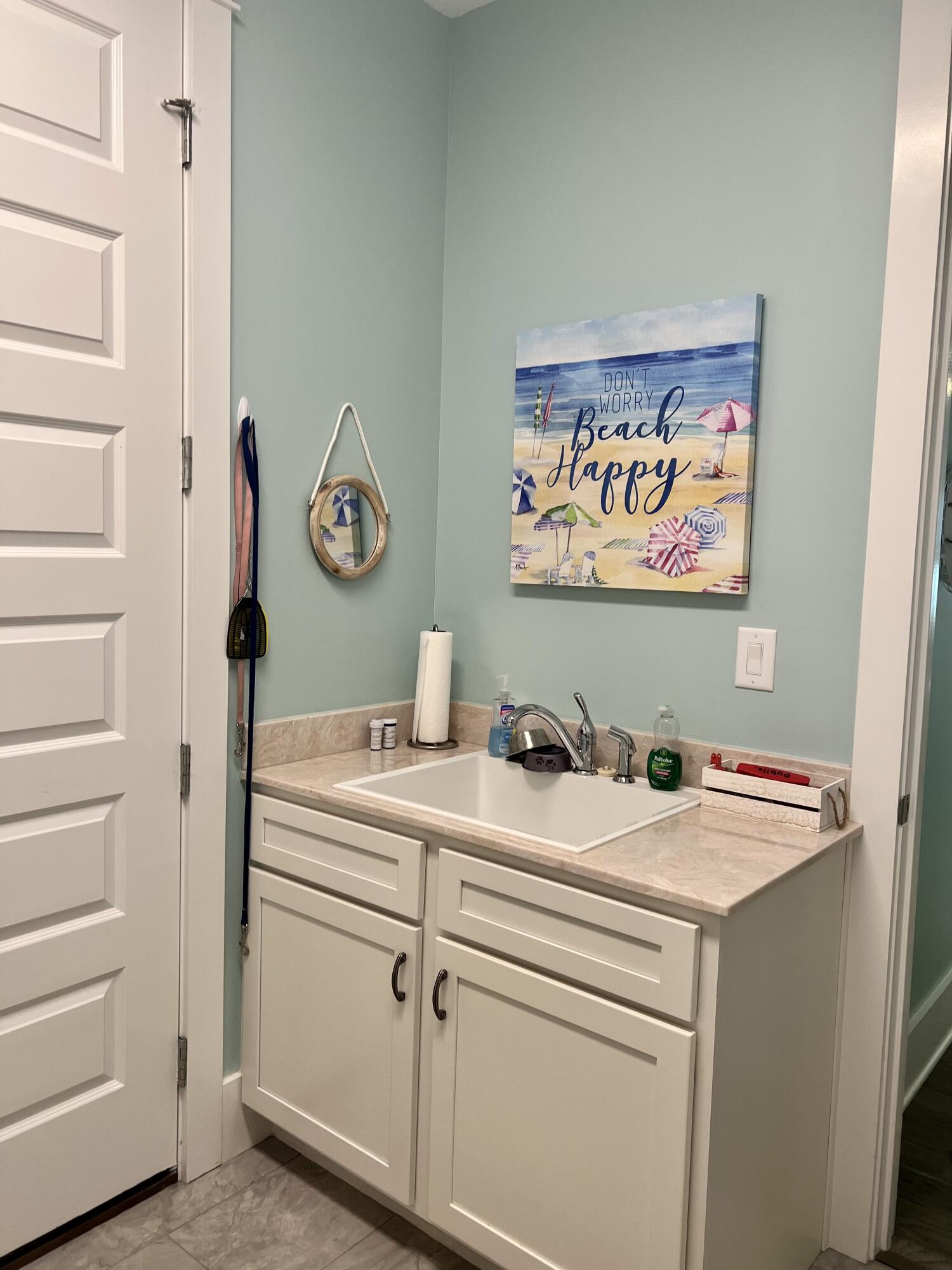 244 Perimeter Place Freeport, FL 32439 - Photo 58 of 72 a view of washer and dryer with wooden floor