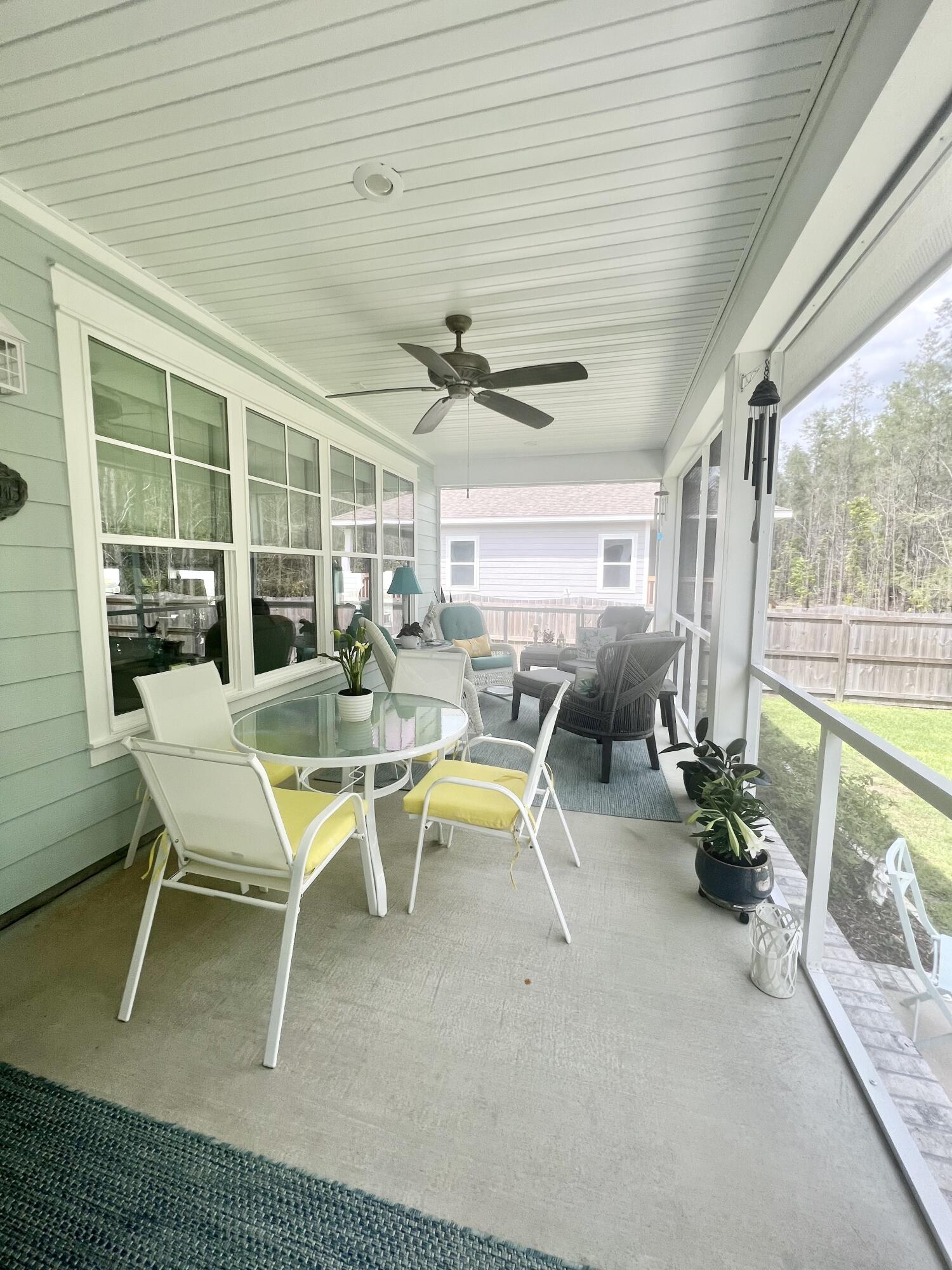 244 Perimeter Place Freeport, FL 32439 - Photo 59 of 72 a view of a dining room with furniture window and outside view