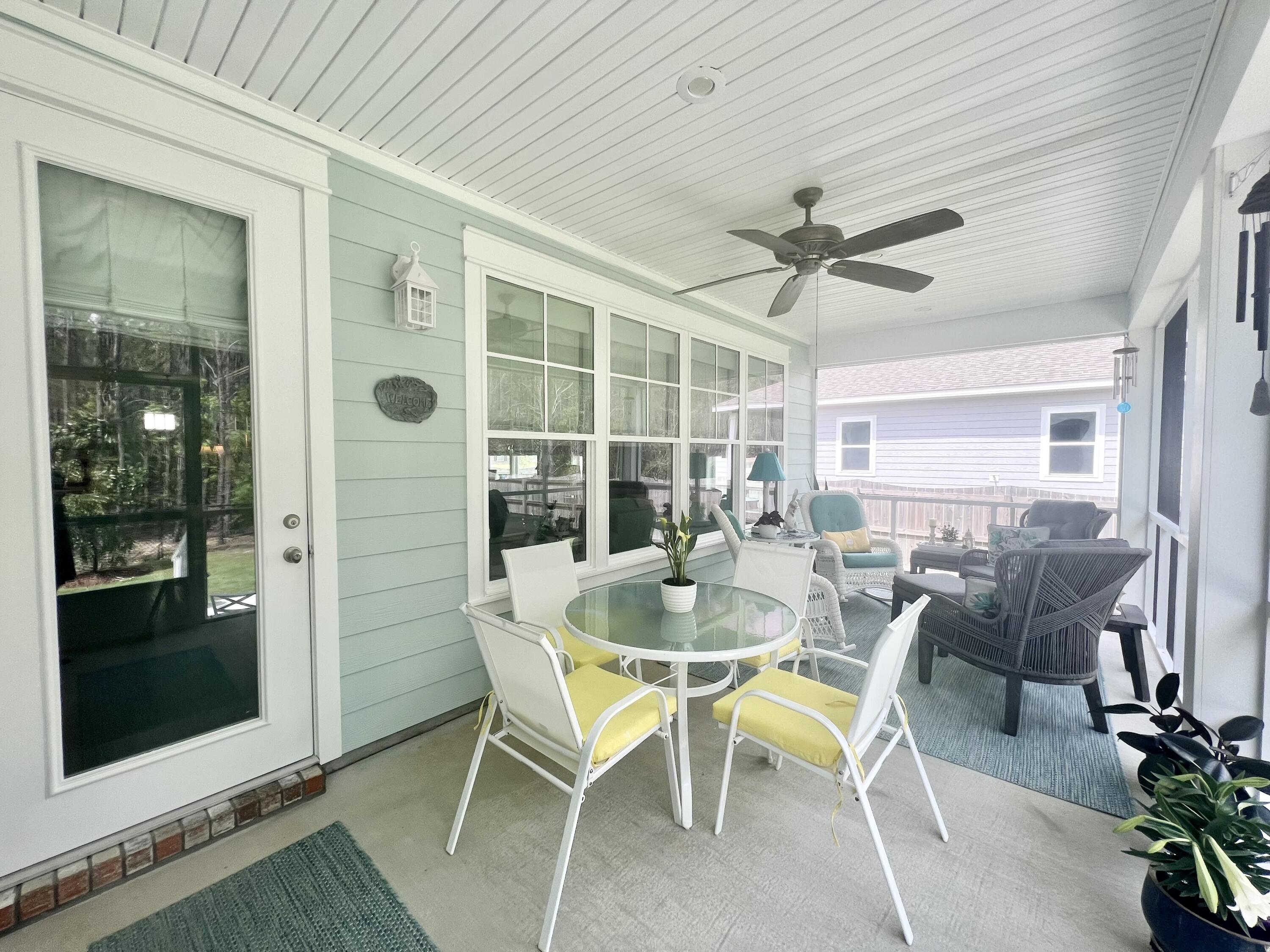 244 Perimeter Place Freeport, FL 32439 - Photo 60 of 72 a view of a dining room with furniture window and outside view