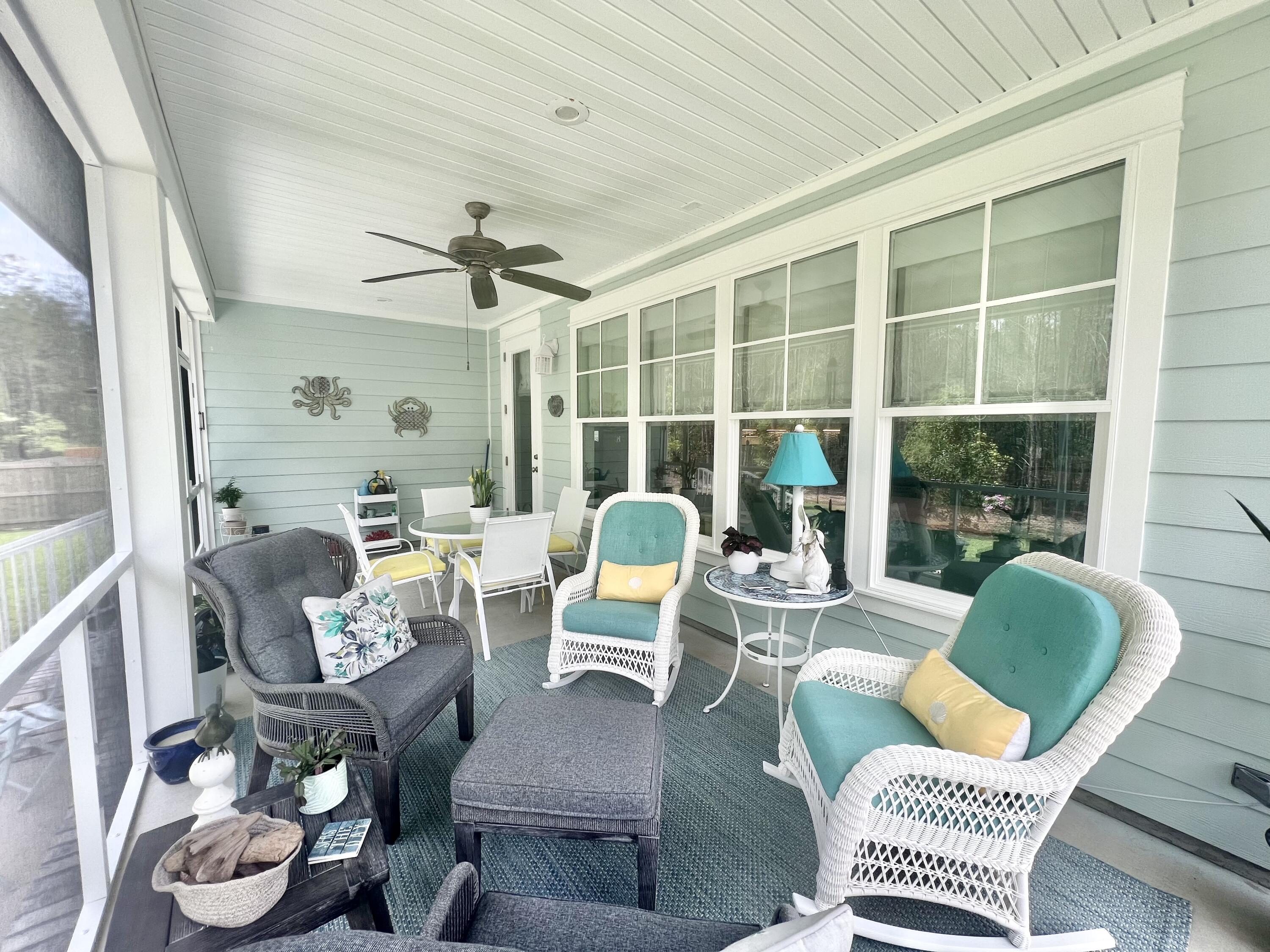 244 Perimeter Place Freeport, FL 32439 - Photo 62 of 72 a outdoor living space with furniture and a window
