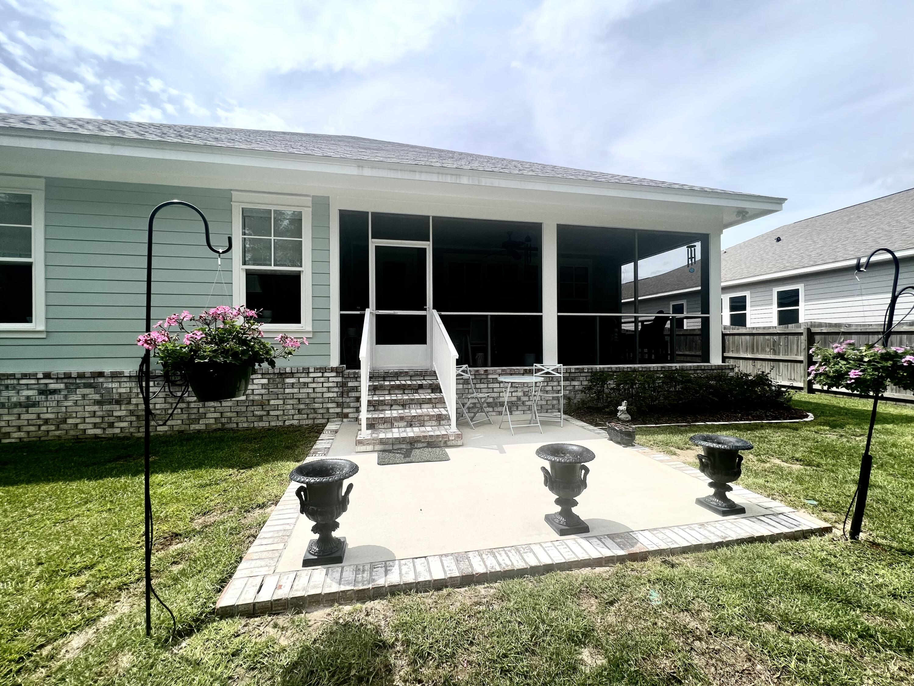 244 Perimeter Place Freeport, FL 32439 - Photo 63 of 72 a view of a house with backyard