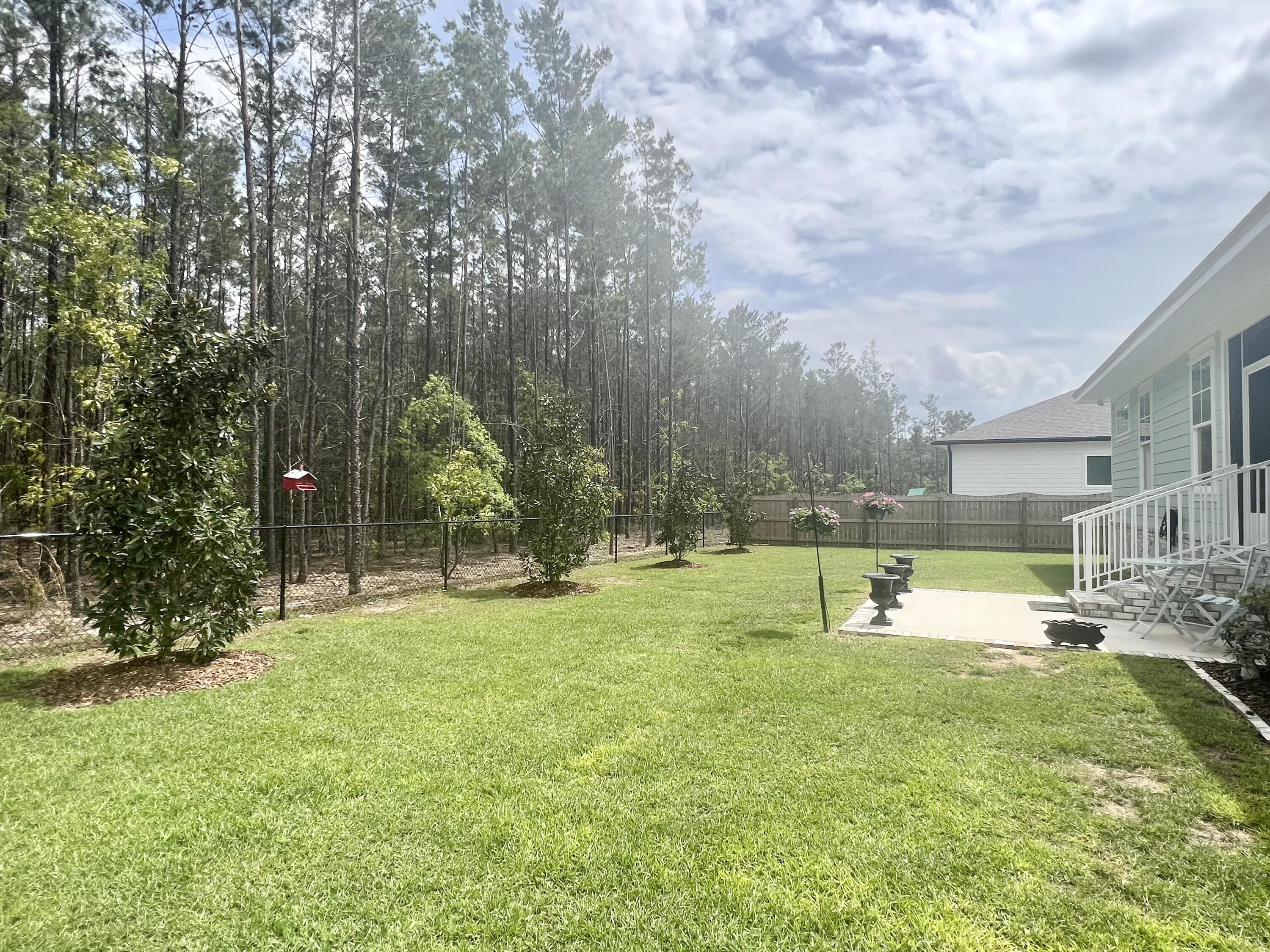 244 Perimeter Place Freeport, FL 32439 - Photo 71 of 72 a view of a park with swings and slides
