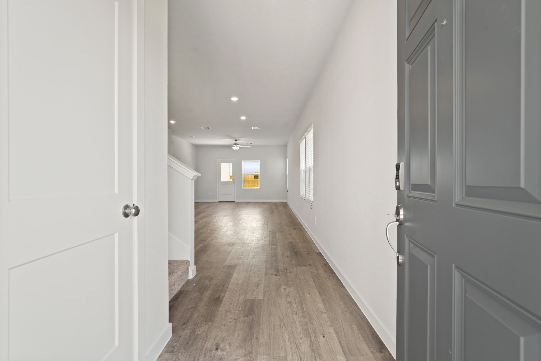 136 Rising Cedar Lane Hockley, TX 77447 - Photo 3 of 22 a view of gallery with wooden floor