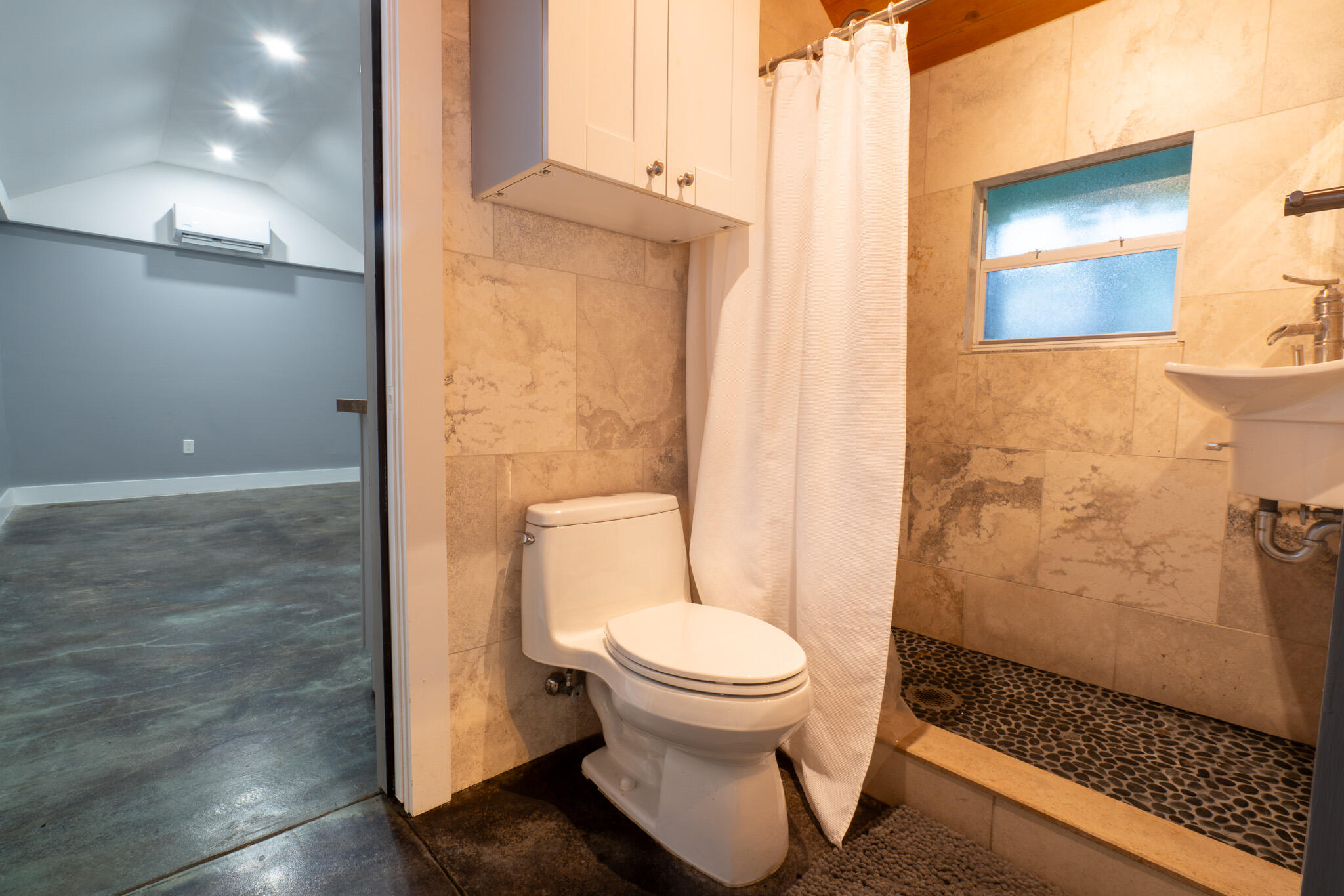 1120 Seminary Street Key West, FL 33040 - Photo 33 of 42 a bathroom with a toilet and a shower