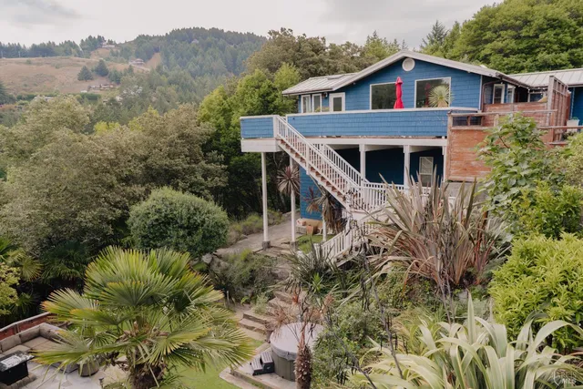 a house view with a garden space
