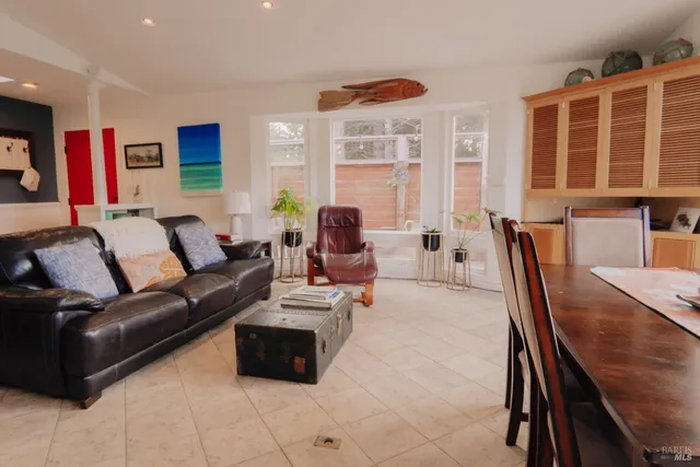 a kitchen with stainless steel appliances a stove a sink and a microwave