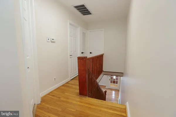 a view of a hallway with two space