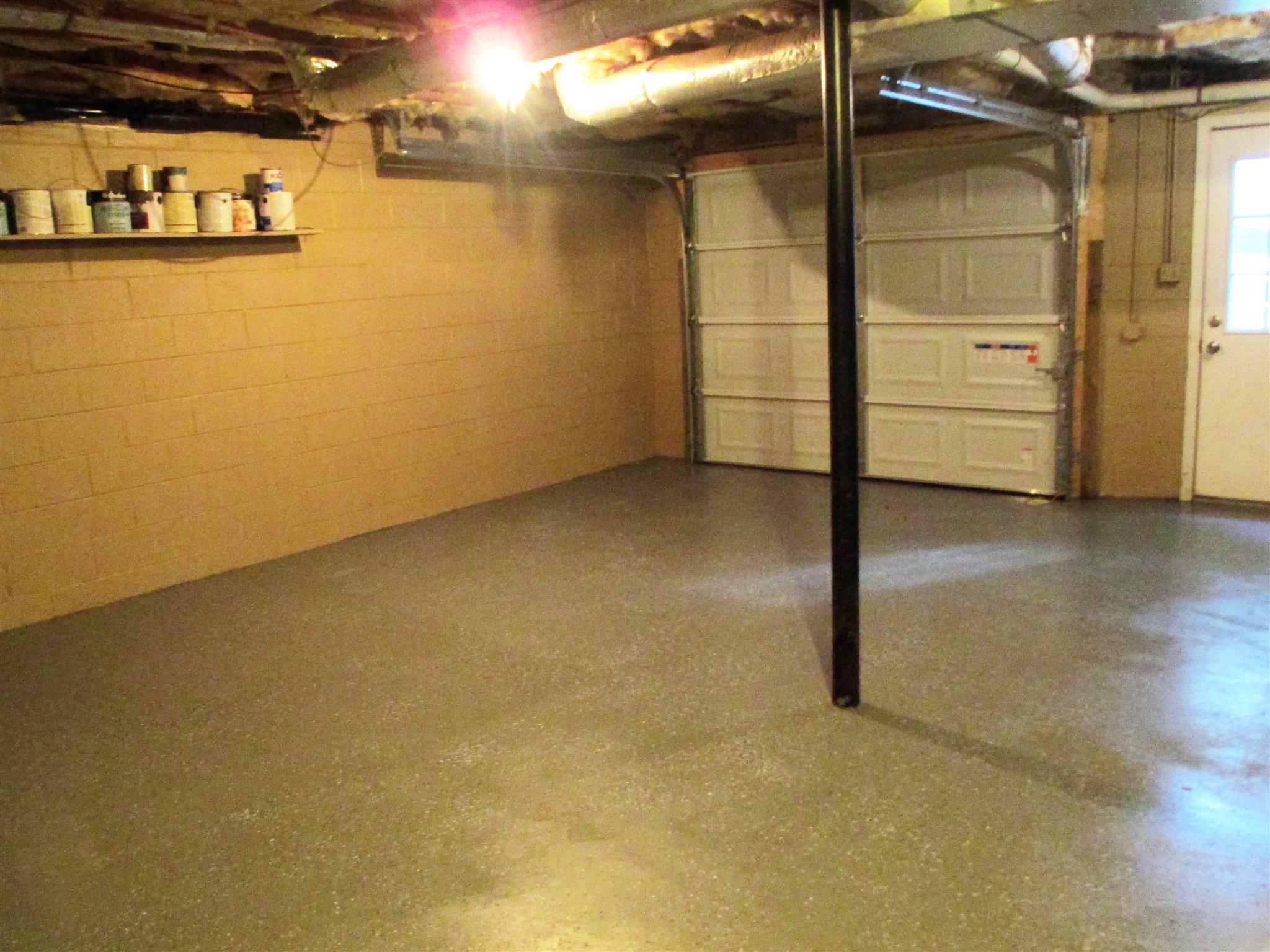 3208 Cedar Ridge Road Nashville, TN 37214 - Photo 14 of 18 New garage door & lots of storage in basement with pedestrian door