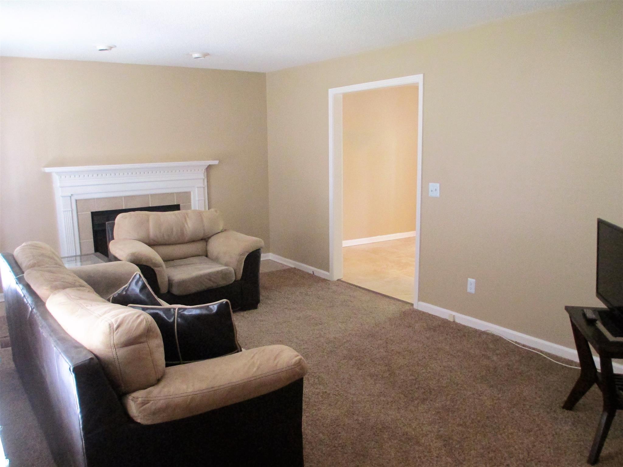 Living room (front to back of property)