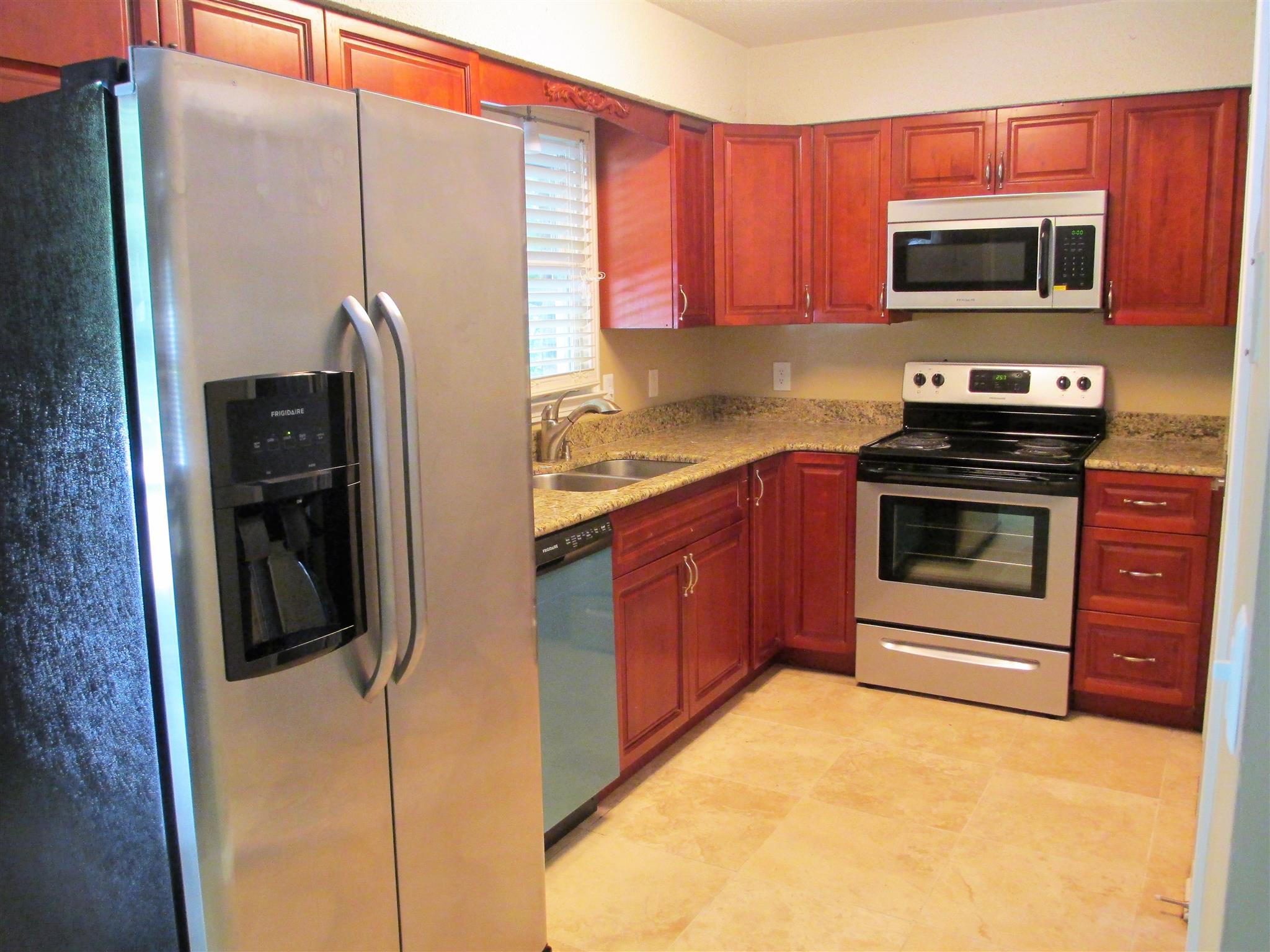 New cabinets & granite counters - stainless steel appliances