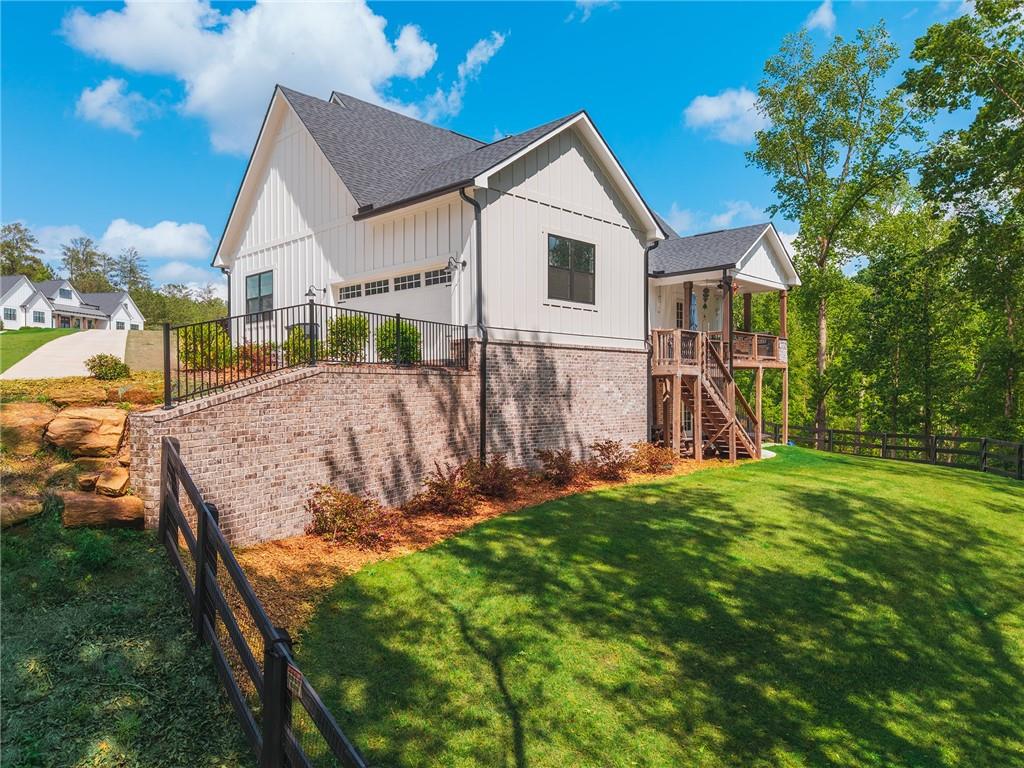 392 London Road Ball Ground, GA 30107 - Photo 34 of 53 a view of a house with yard and sitting area