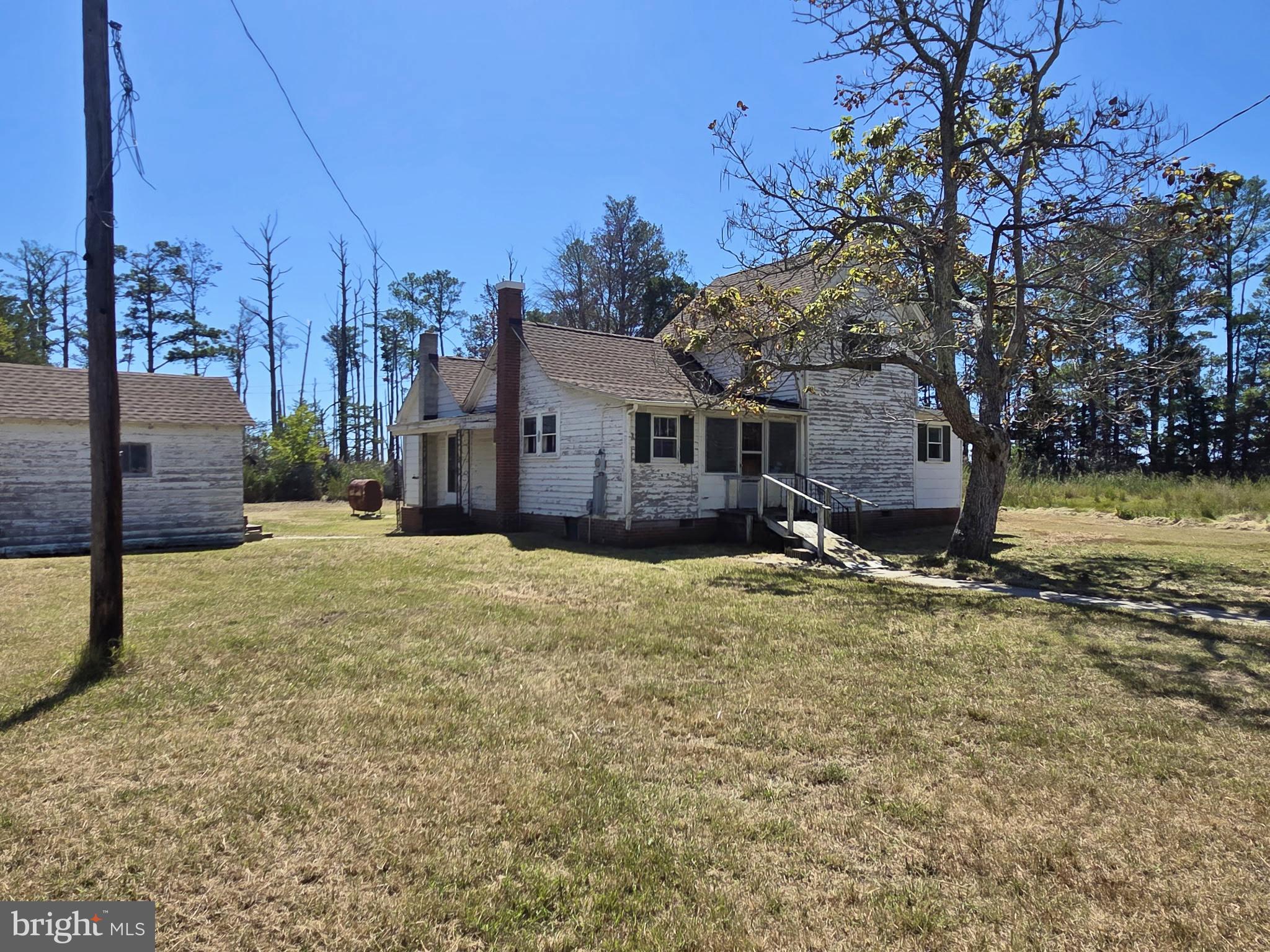 Brady Todd Road Crocheron, MD 21627 - Photo 23 of 111 a view of a house with a yard